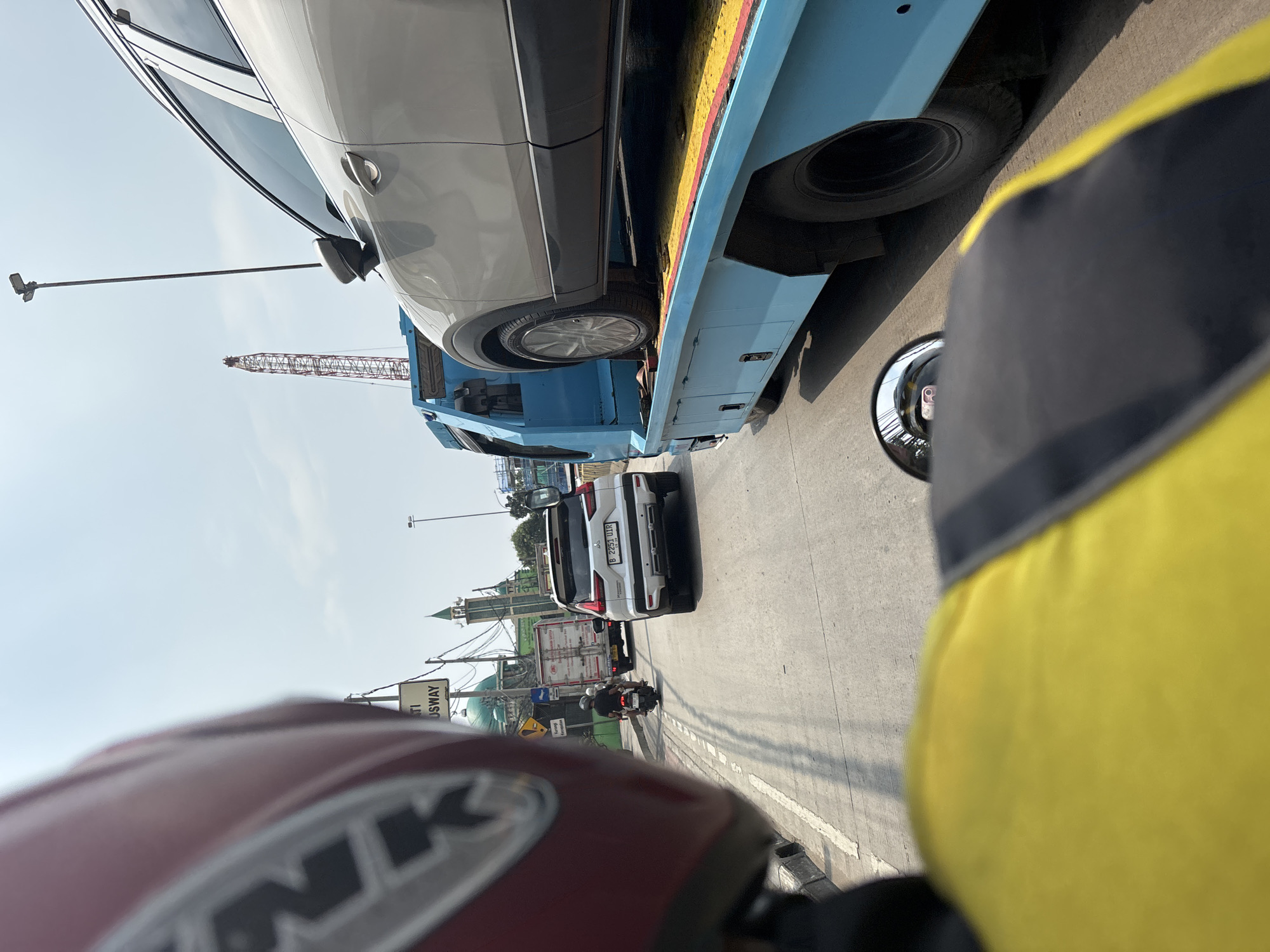 Morning motorcycle commute documented through North Jakarta streets
