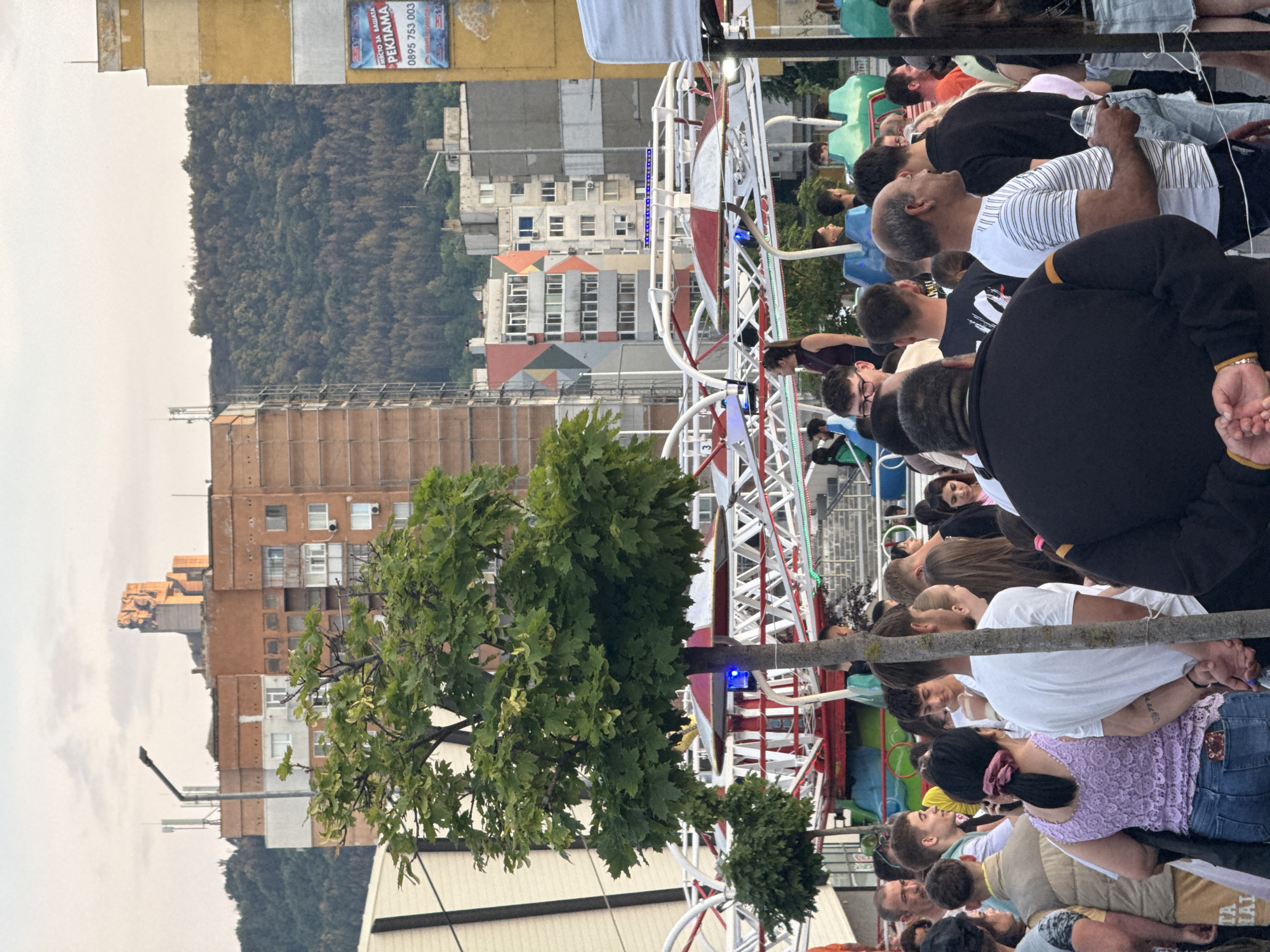 Public festival with rides and stage draws crowds in Shumen