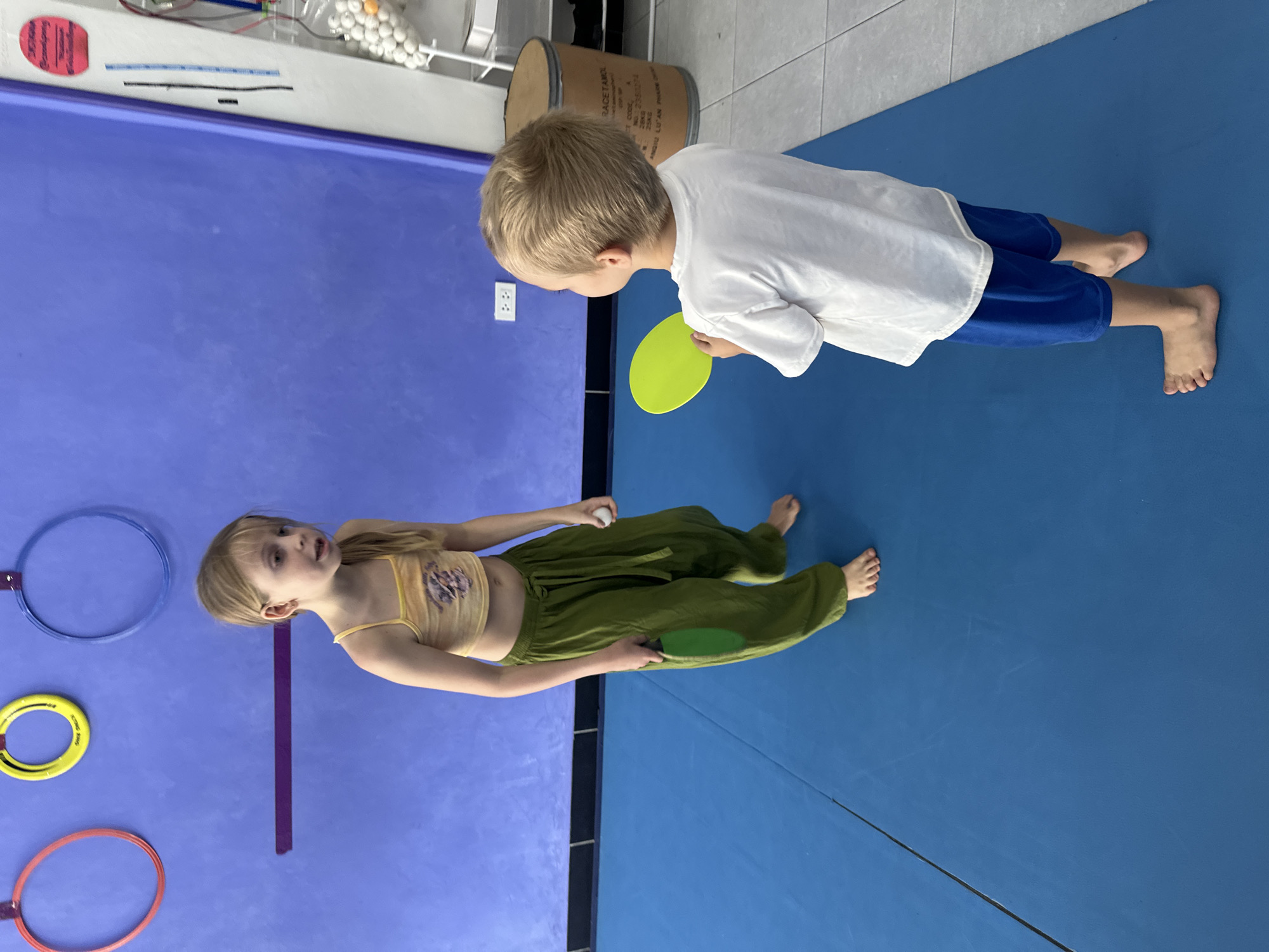 Children play ping pong in Koh Phangan facility