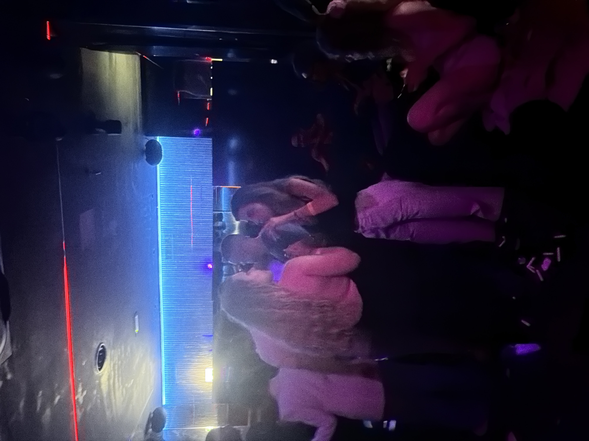 Late night social gathering at Milan entertainment venue