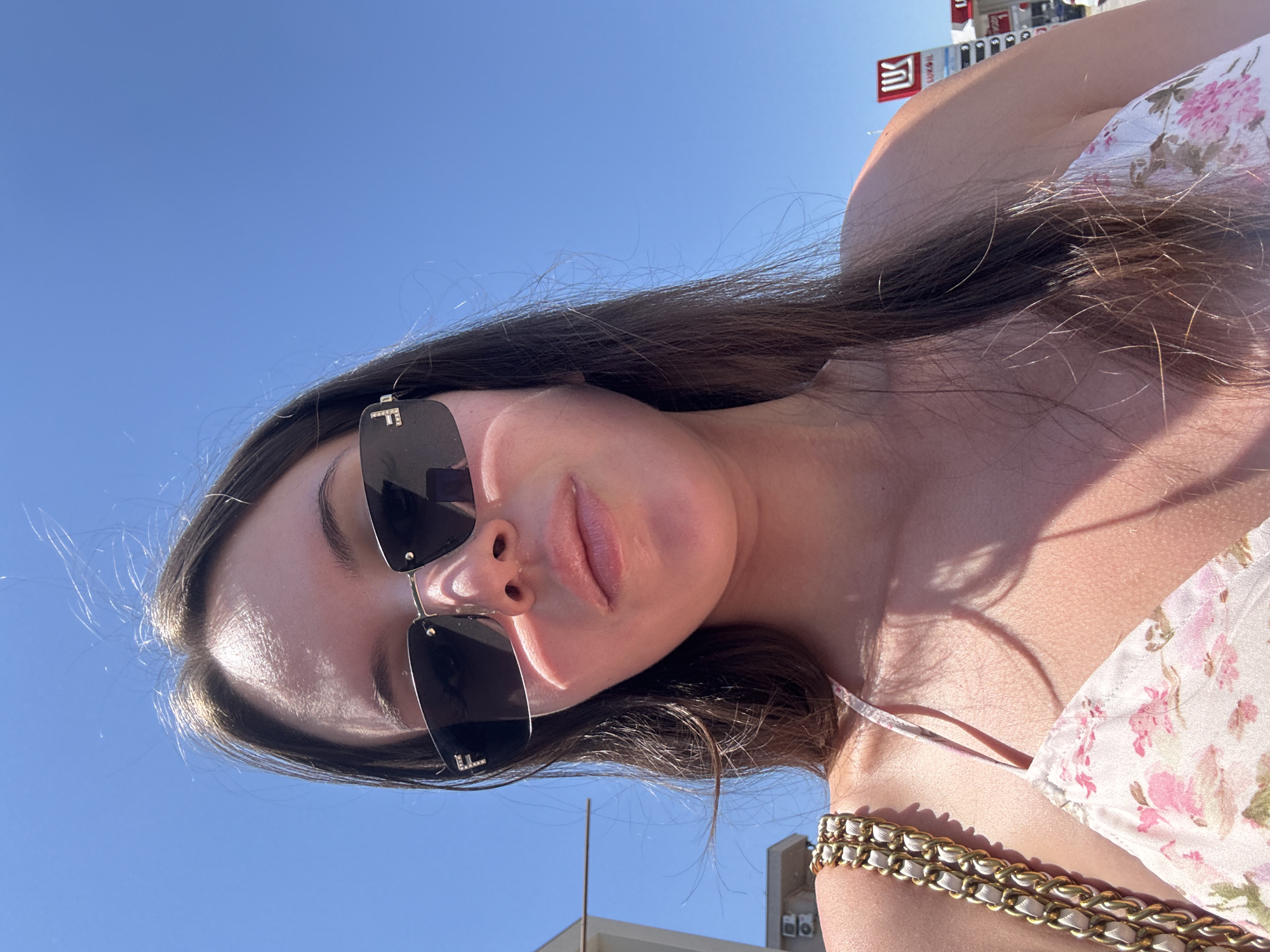 Floral dress, Fendi shades, selfies across elevators and sunny spots