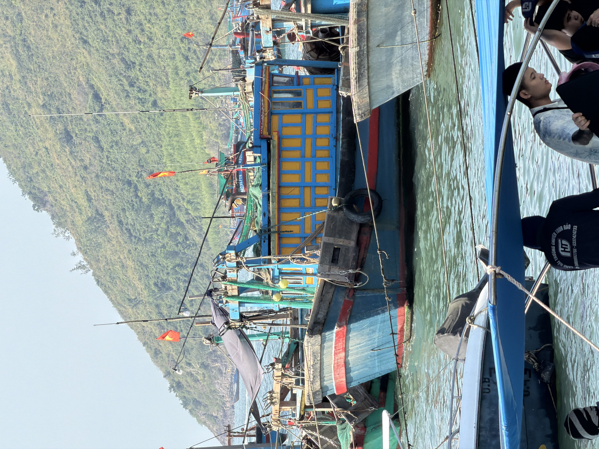 Fishing boats docked in Nha Trang harbor at dawn