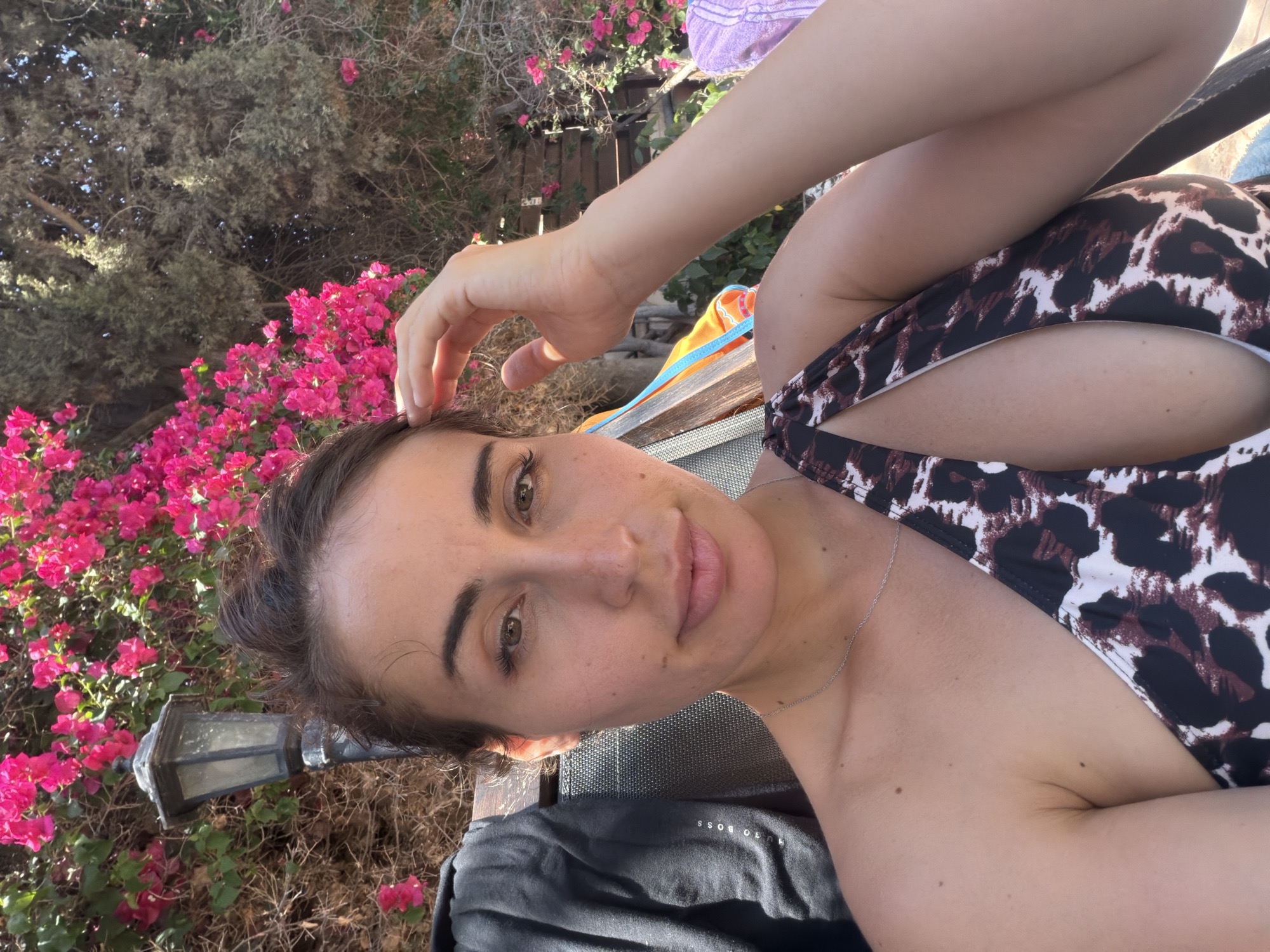 Poolside selfies among bougainvillea in Mazotos, Cyprus