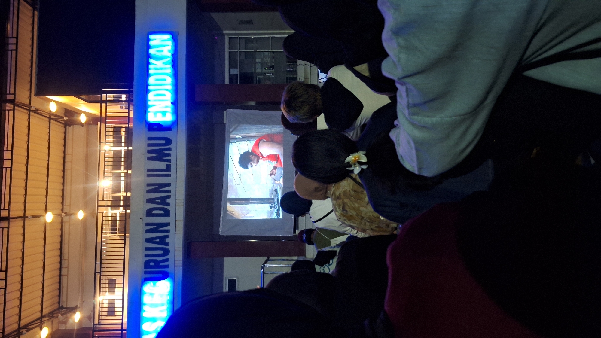 Outdoor movie screening draws crowd in Sukaharja, Indonesia