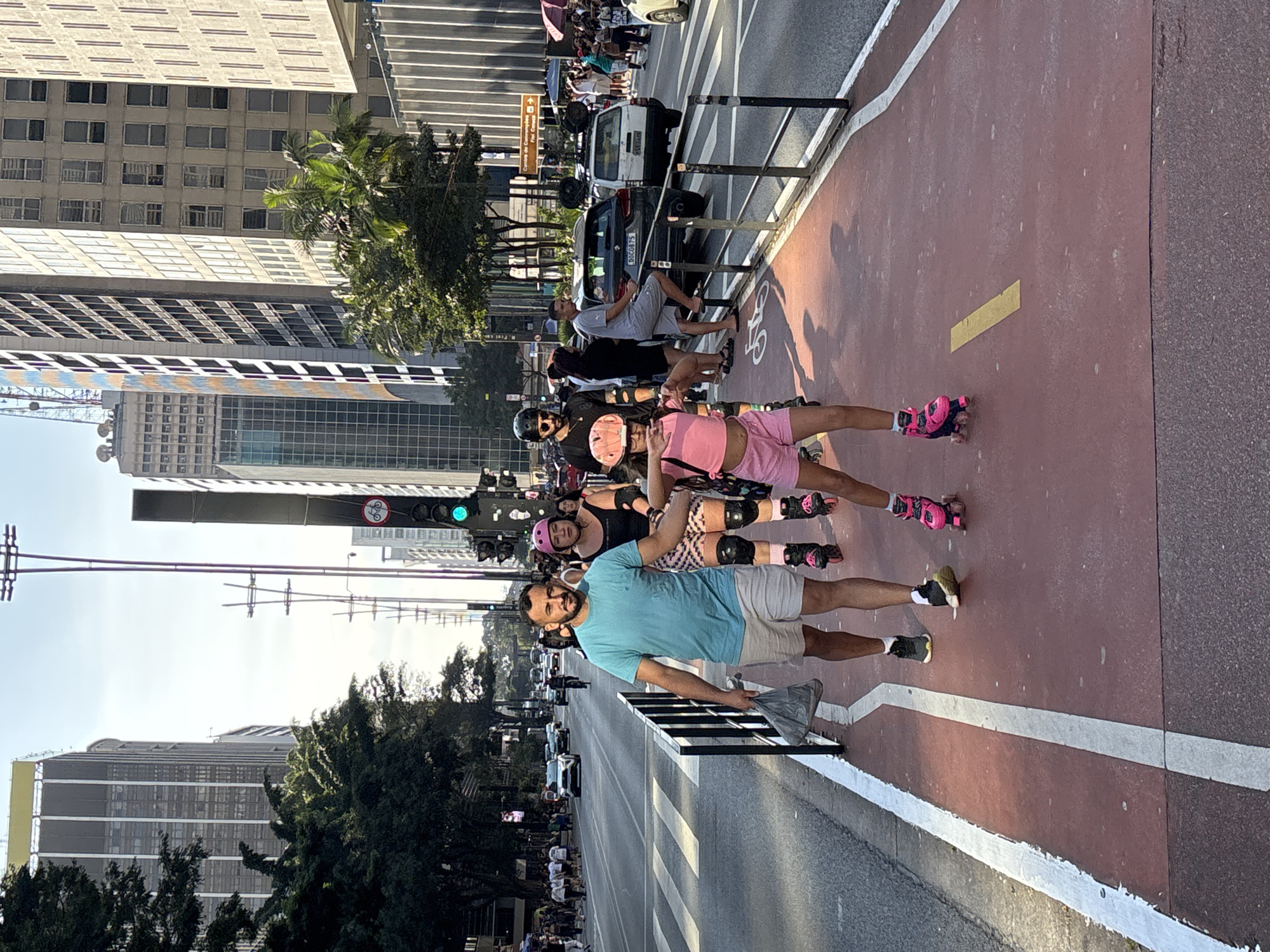 Evening street life captured along São Paulo's Avenida Paulista