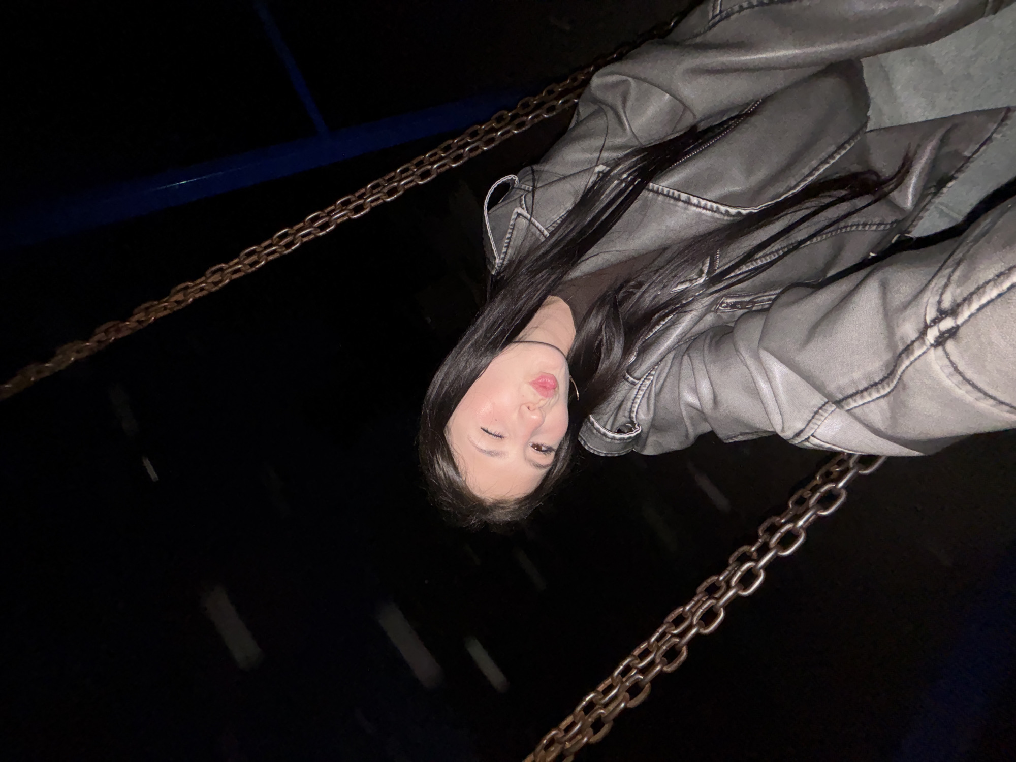 Woman photographs evening visit to playground in Фоки, Russia