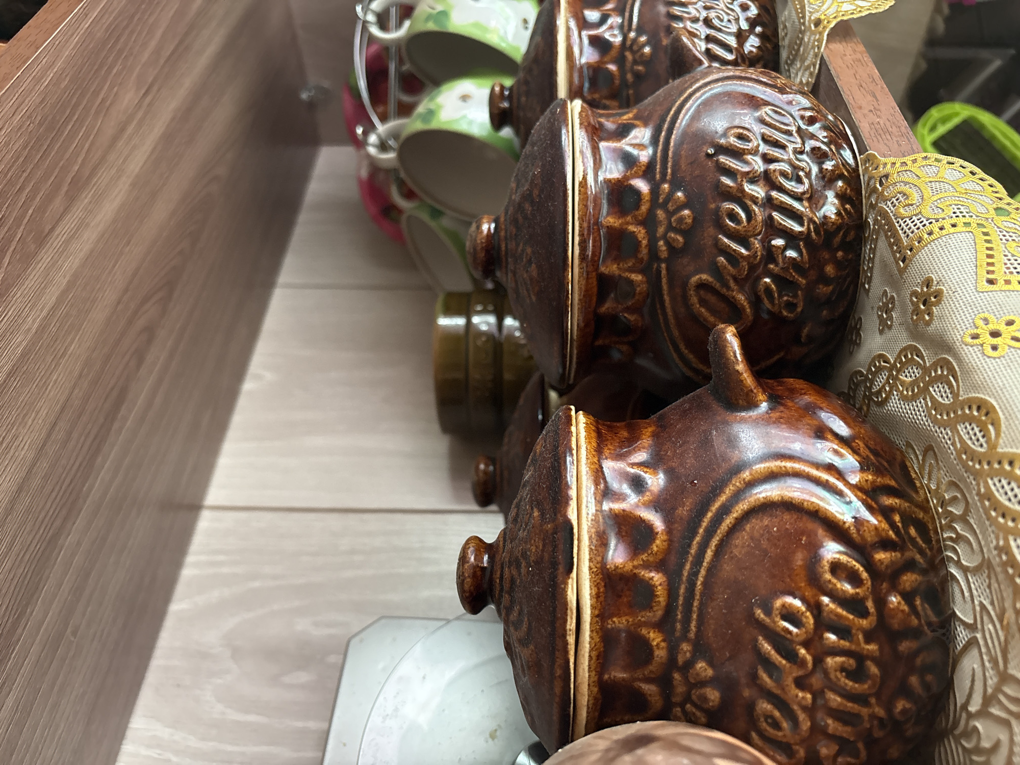Traditional Russian ceramic folk pottery on shelves in Vetluzhsky
