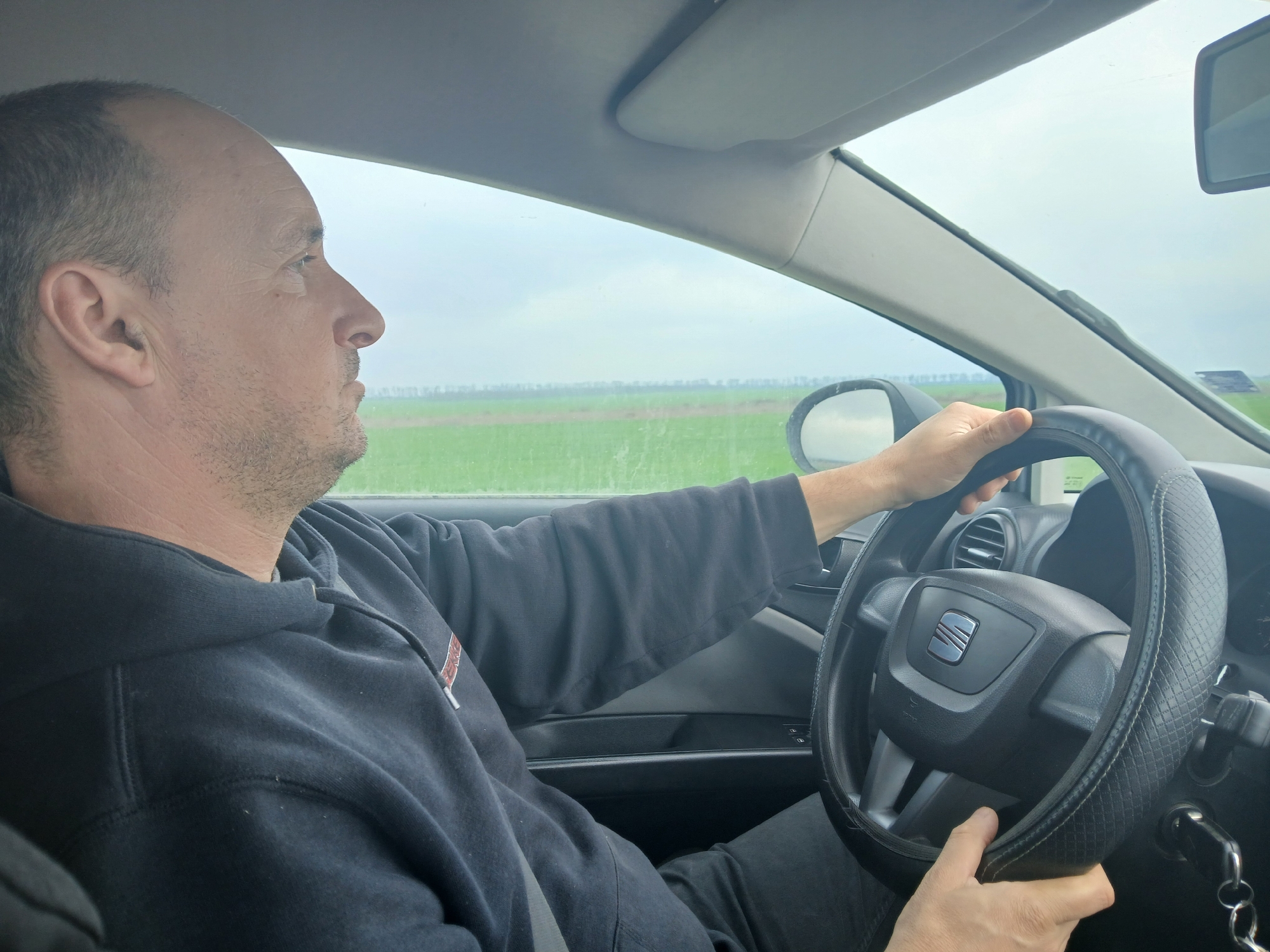 Driver in black hoodie spotted on rural road near Balchik