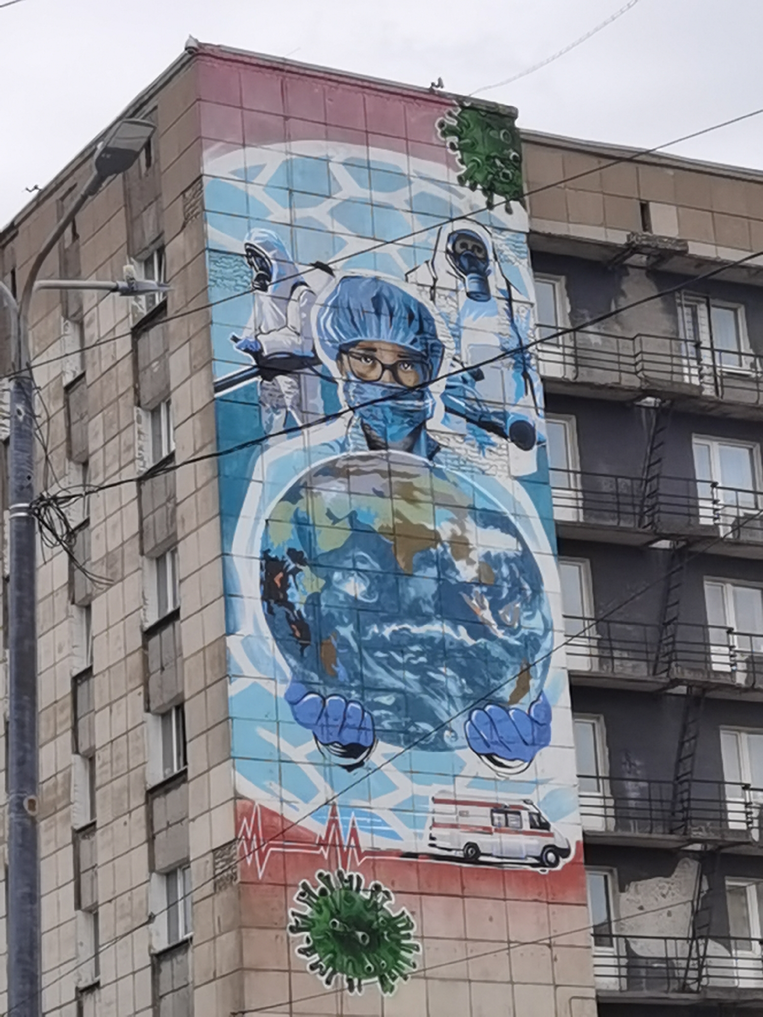 Medical worker mural spotted on Perm apartment building