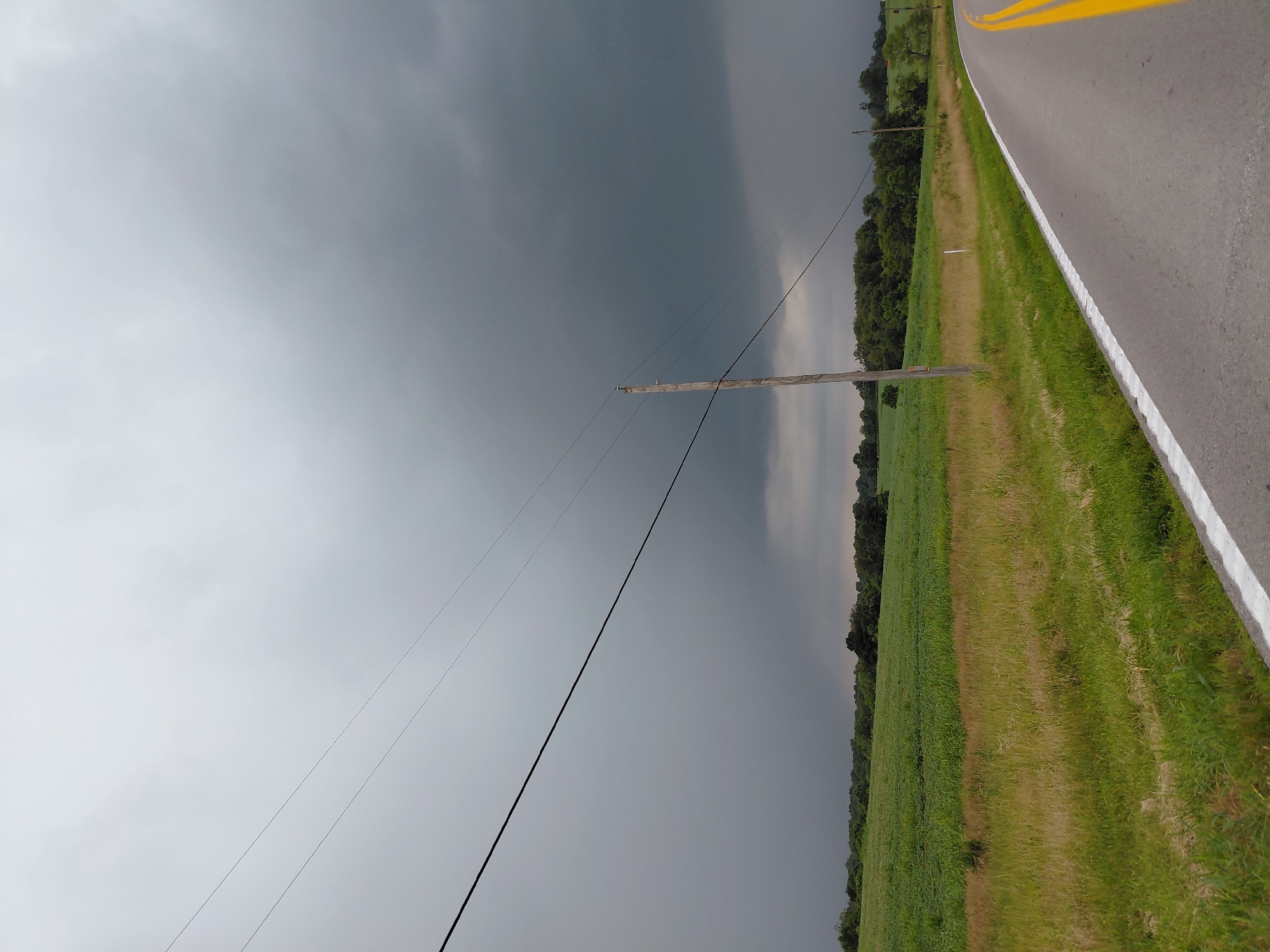 Stormy skies over a rural Kentucky roadside