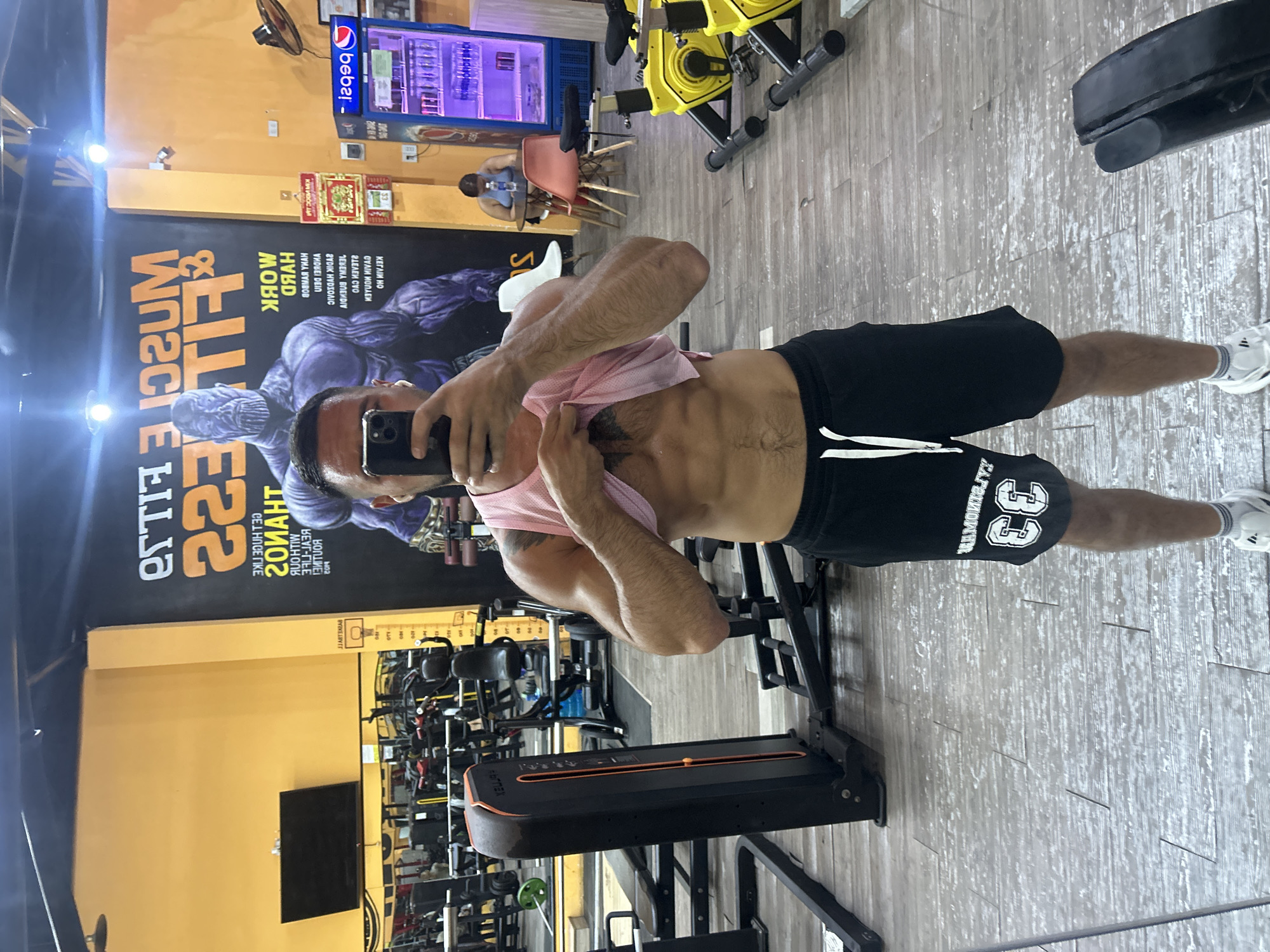 Gym selfies at Nha Trang's Muscle Fitness 223 mid-workout