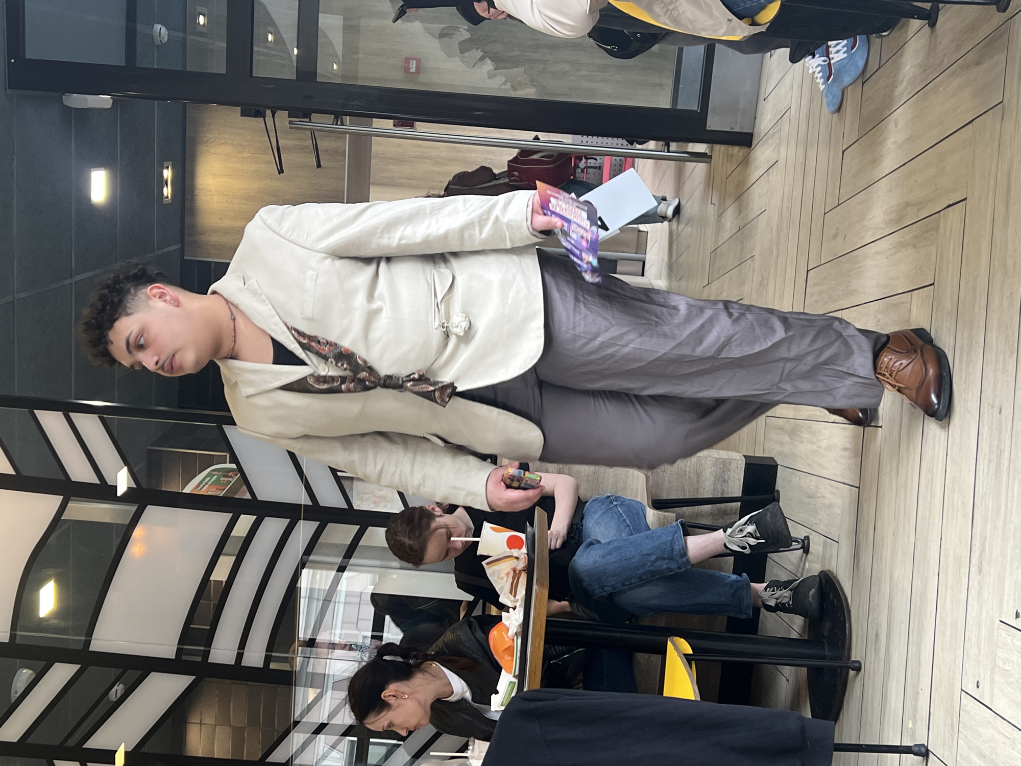 Tourist documents afternoon walk near Kazan Cathedral, Saint Petersburg