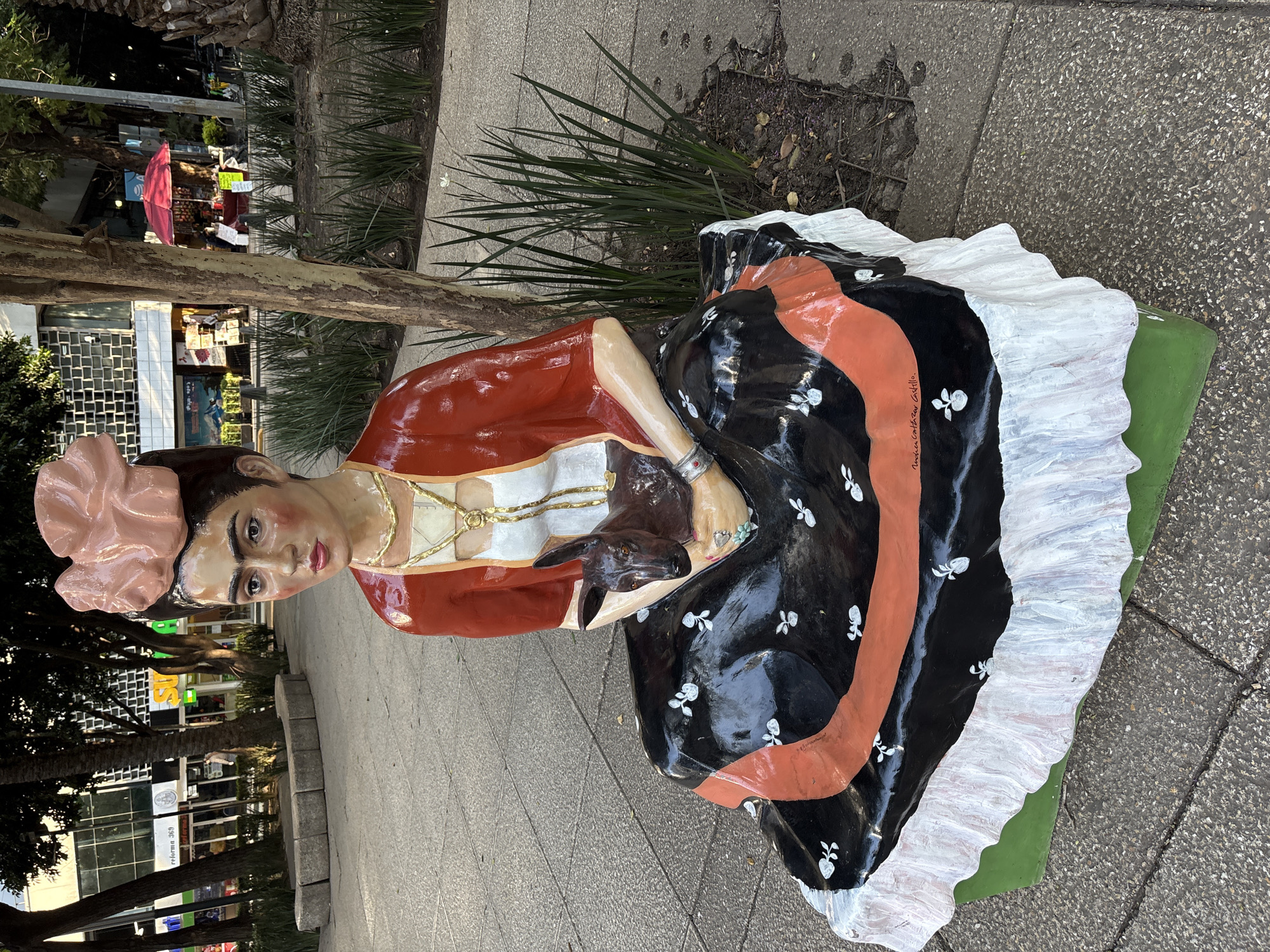 Frida Kahlo statues and city landmarks along Reforma, Mexico City