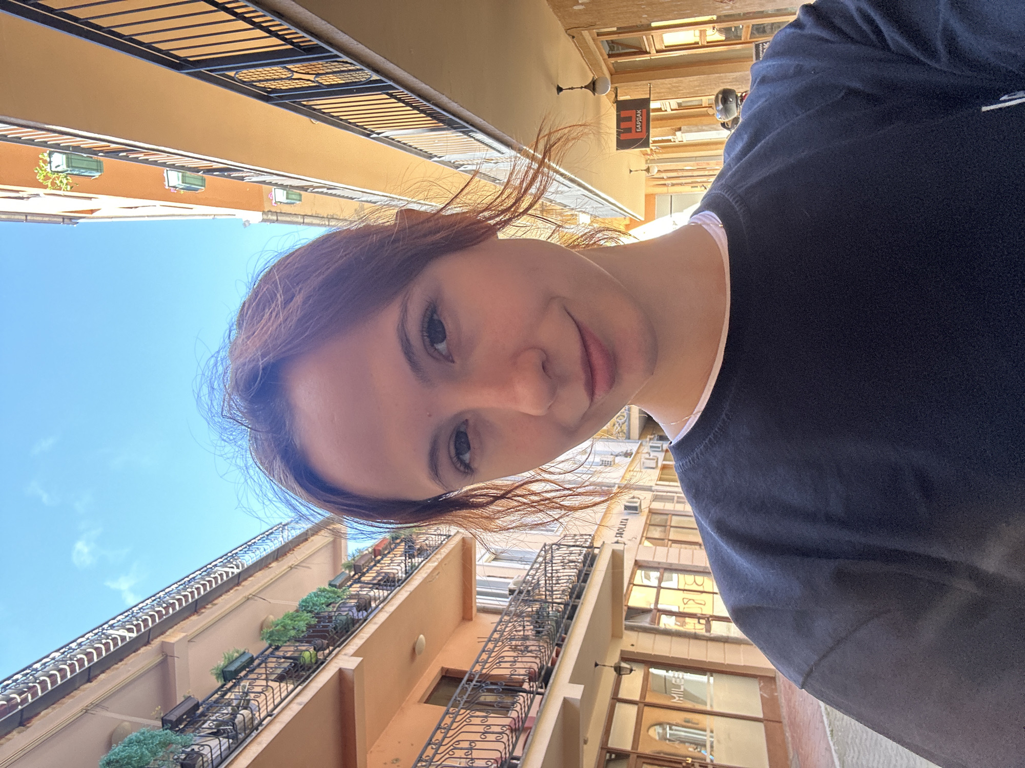Woman takes selfies around Novi Sad, Serbia