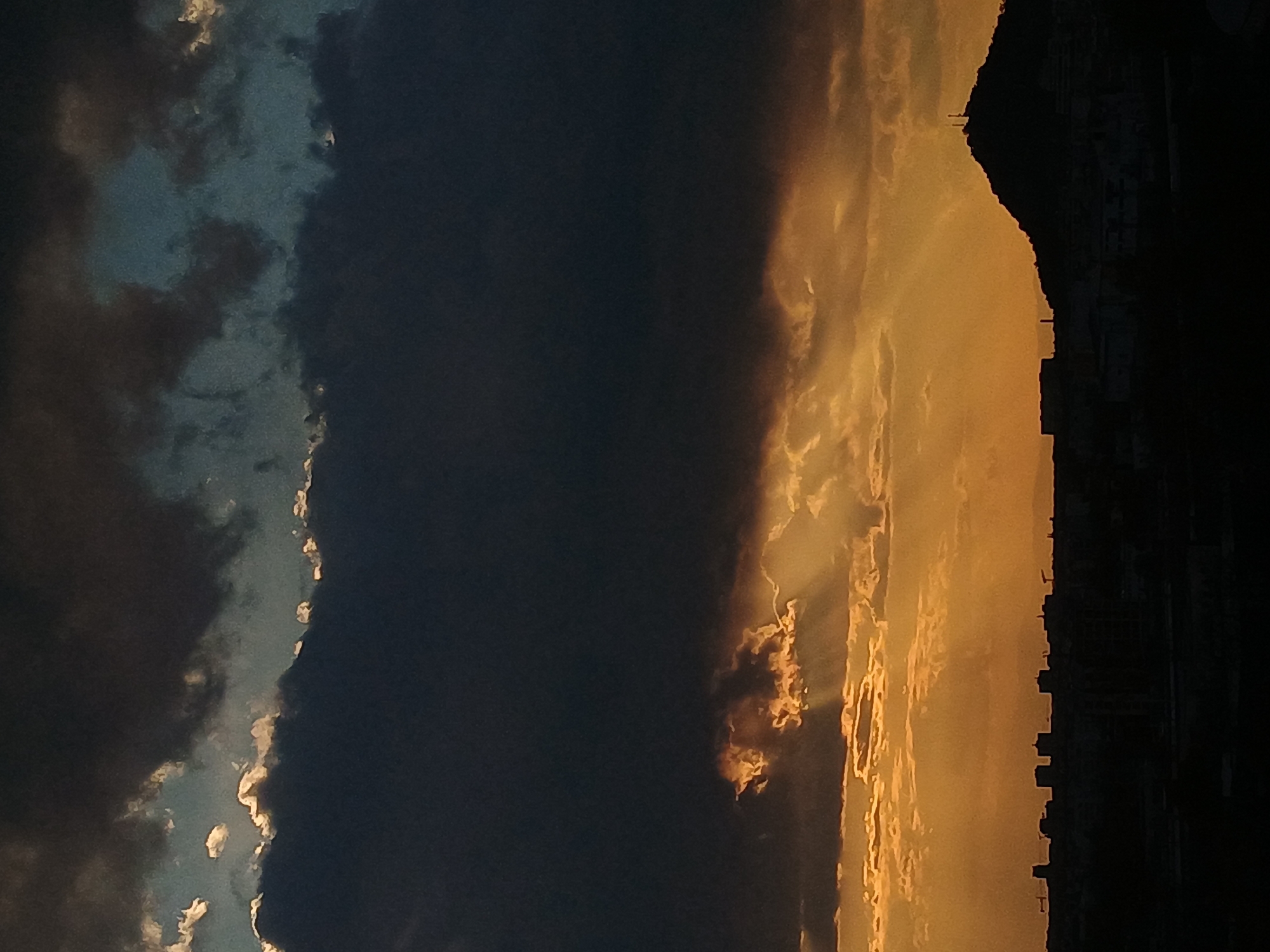 Dramatic sunset with storm clouds captured over Plovdiv, Bulgaria