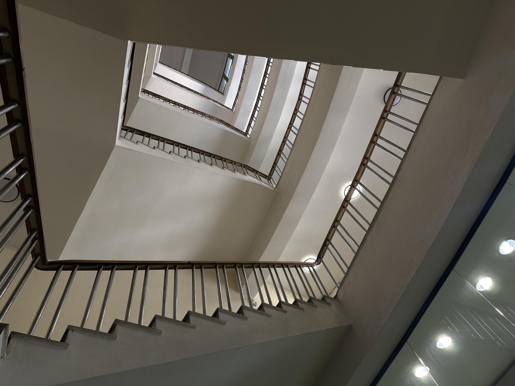 Upward view captured of spiral stairwell in Yerevan
