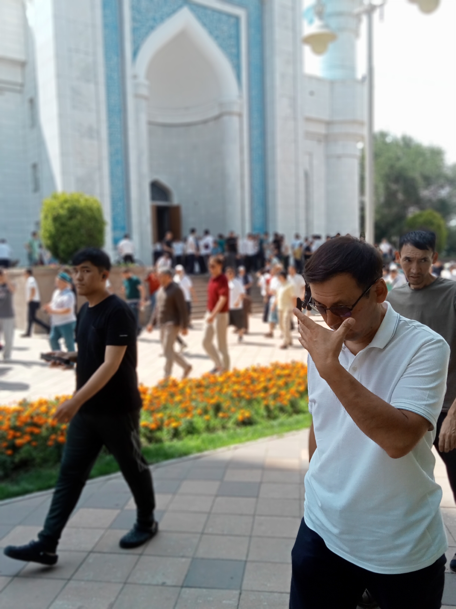Friday prayers at Almaty's Central Mosque, inside and out