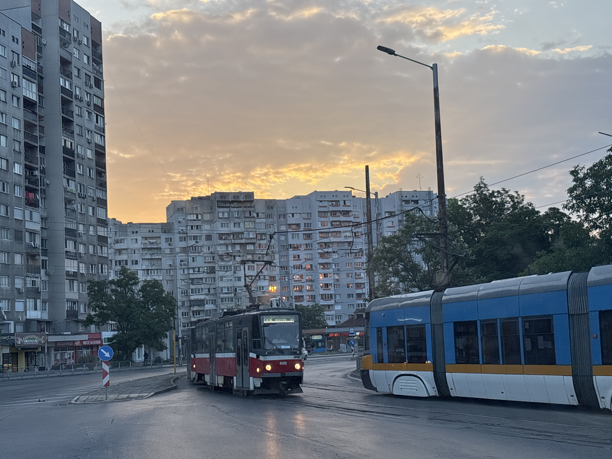 Trams rolling through quiet Sofia streets in the early hours