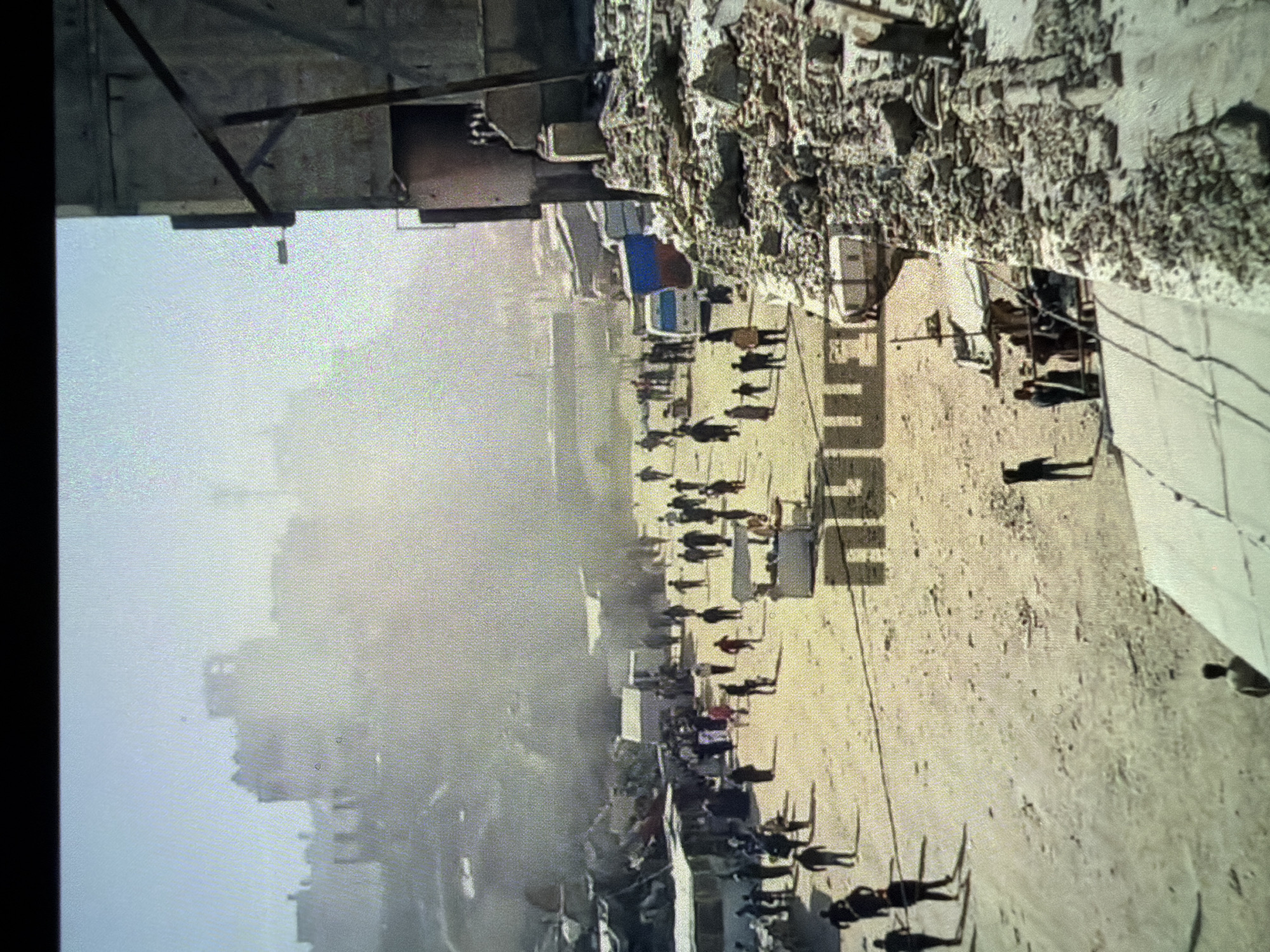 Major building fire causes extensive urban damage and debris