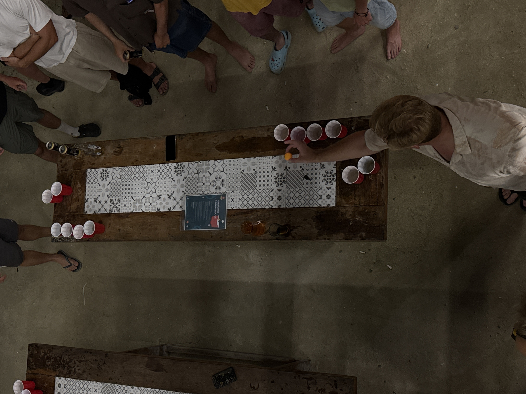Young adults gather for beer pong night in General Luna