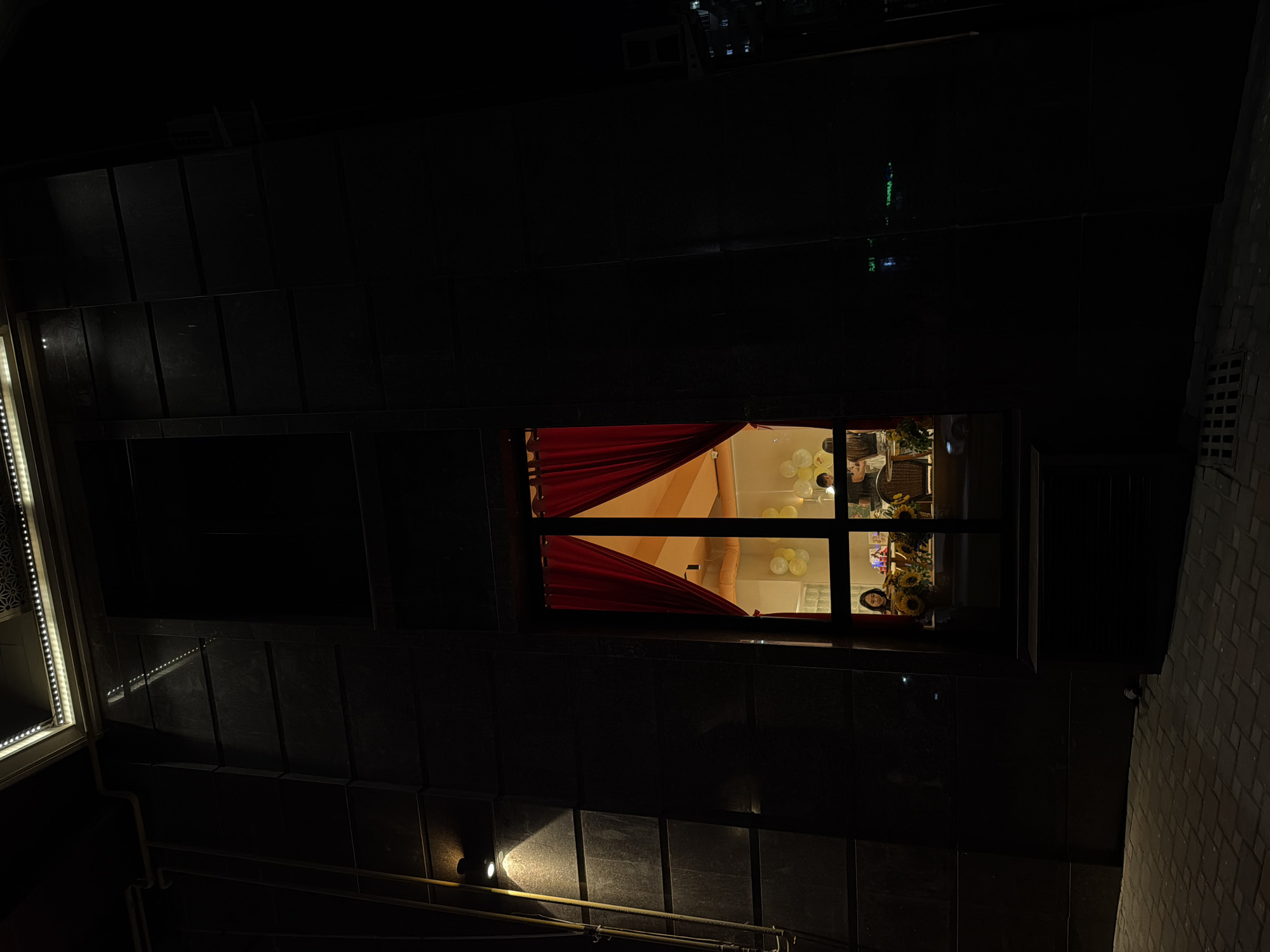 Illuminated building photographed at night in Bishkek, Kyrgyzstan