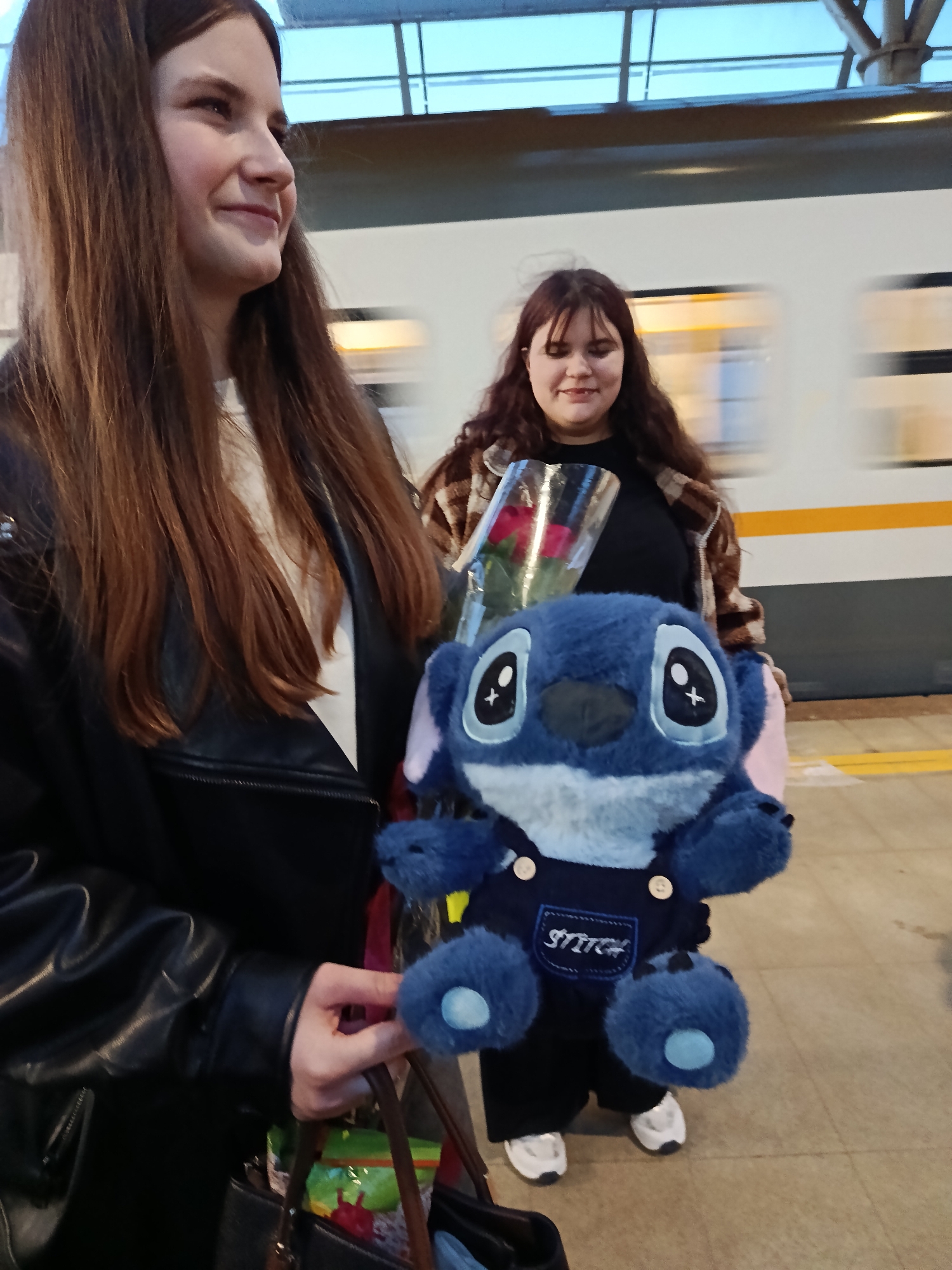 Two women spotted with belongings at Moscow train platform