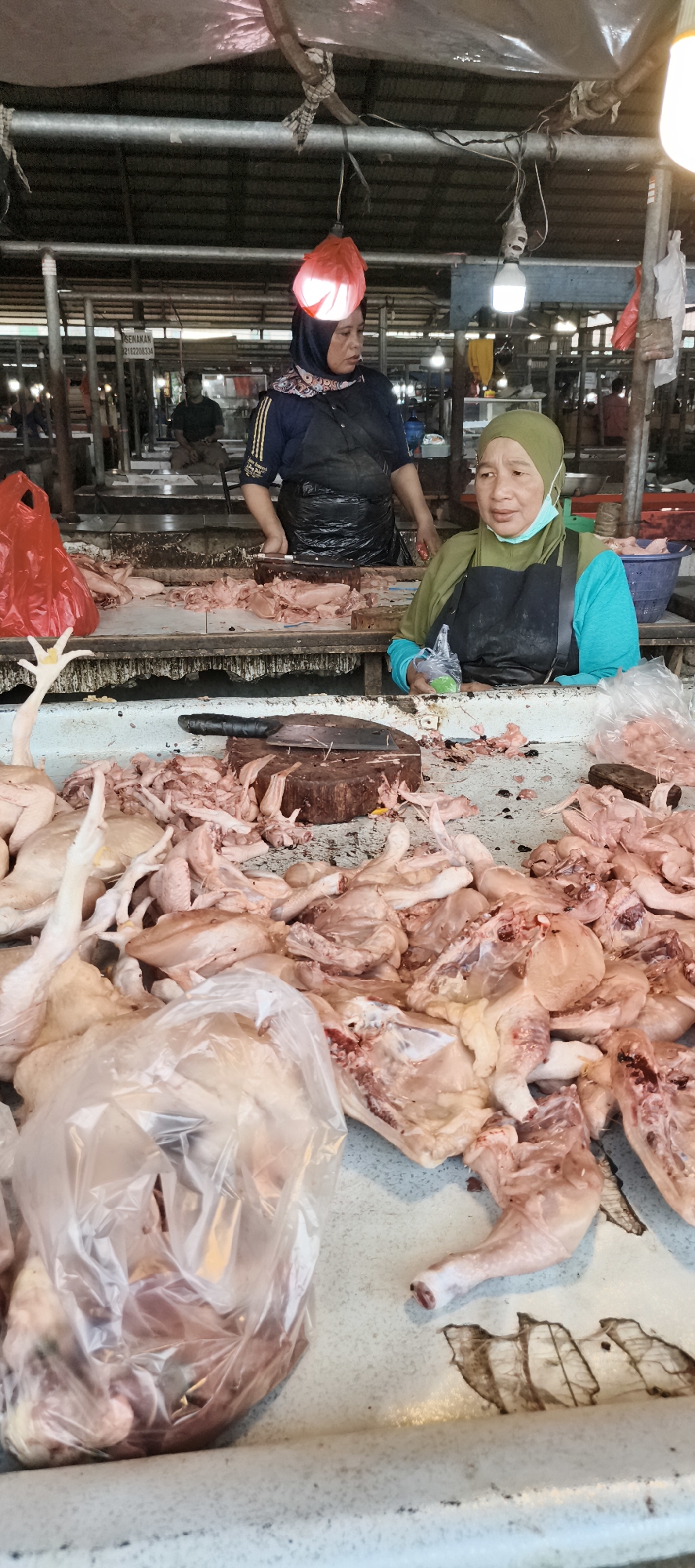 Morning hustle at a traditional produce market in Jambi