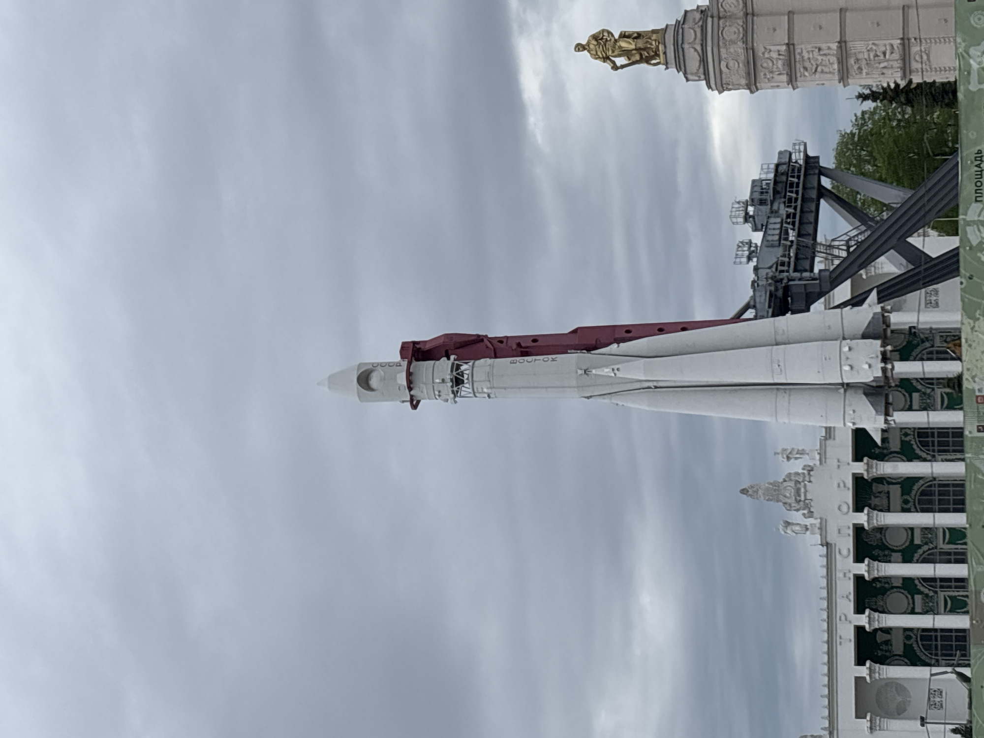 Visitor documents VDNKh park scenes including Vostok rocket display