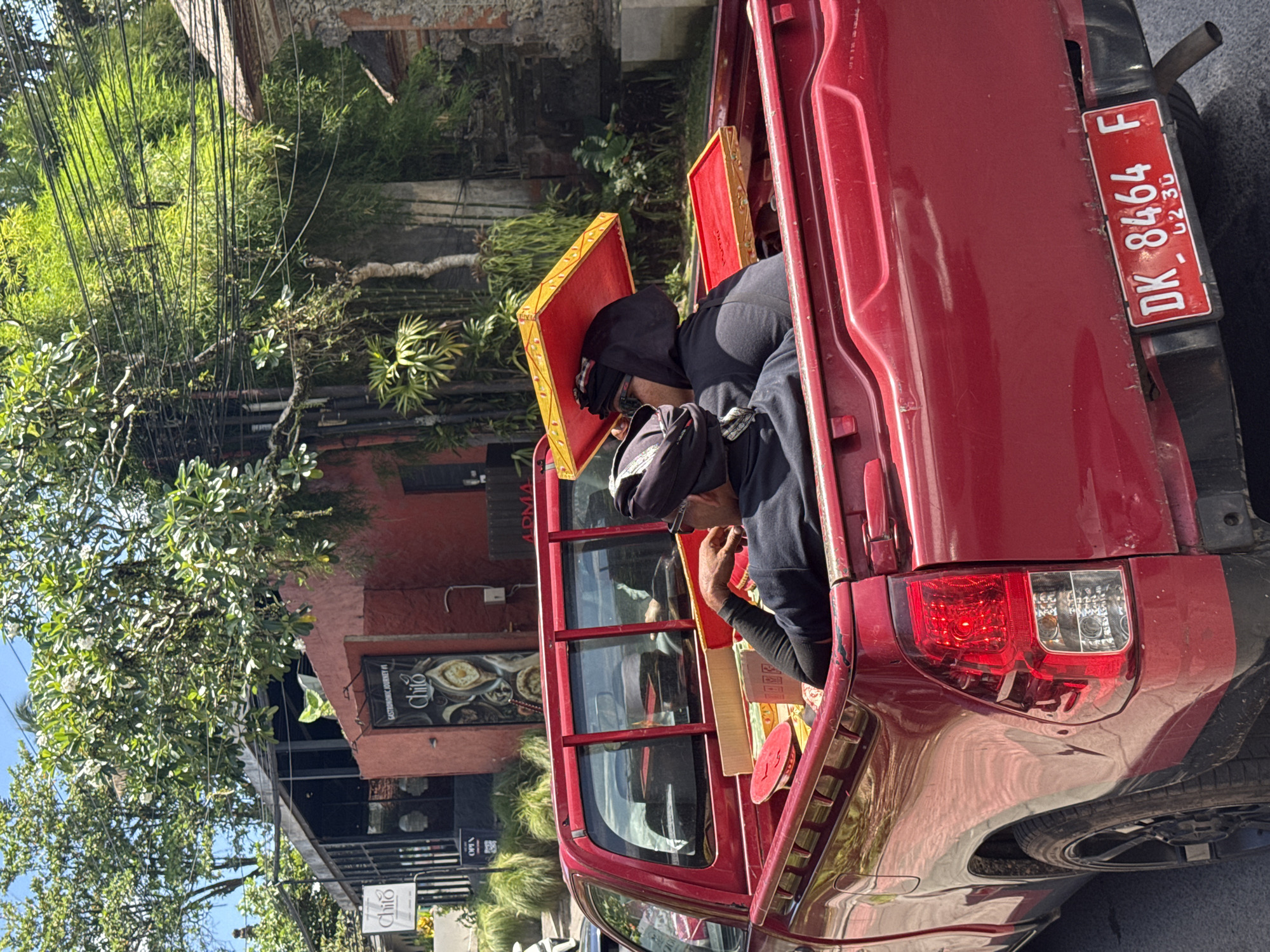 Vehicles spotted on Ubud street during early morning hours