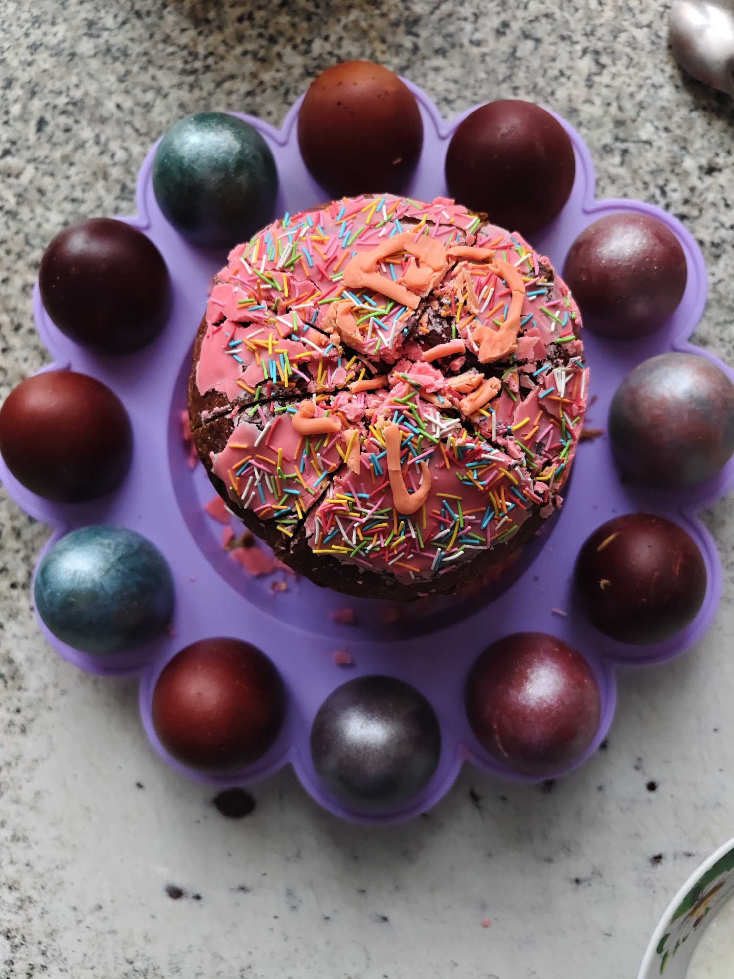 Family celebrates Easter with traditional cake and eggs in Russia