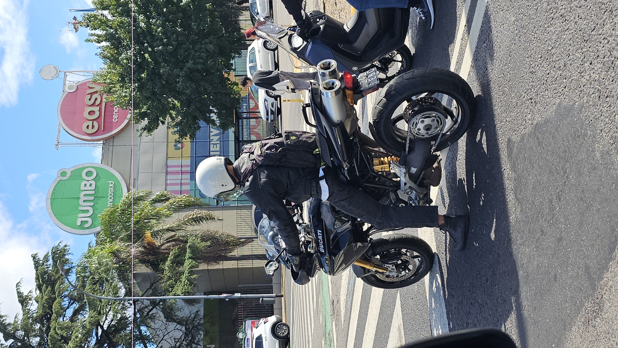 Ducati motorcyclist stops on Buenos Aires street