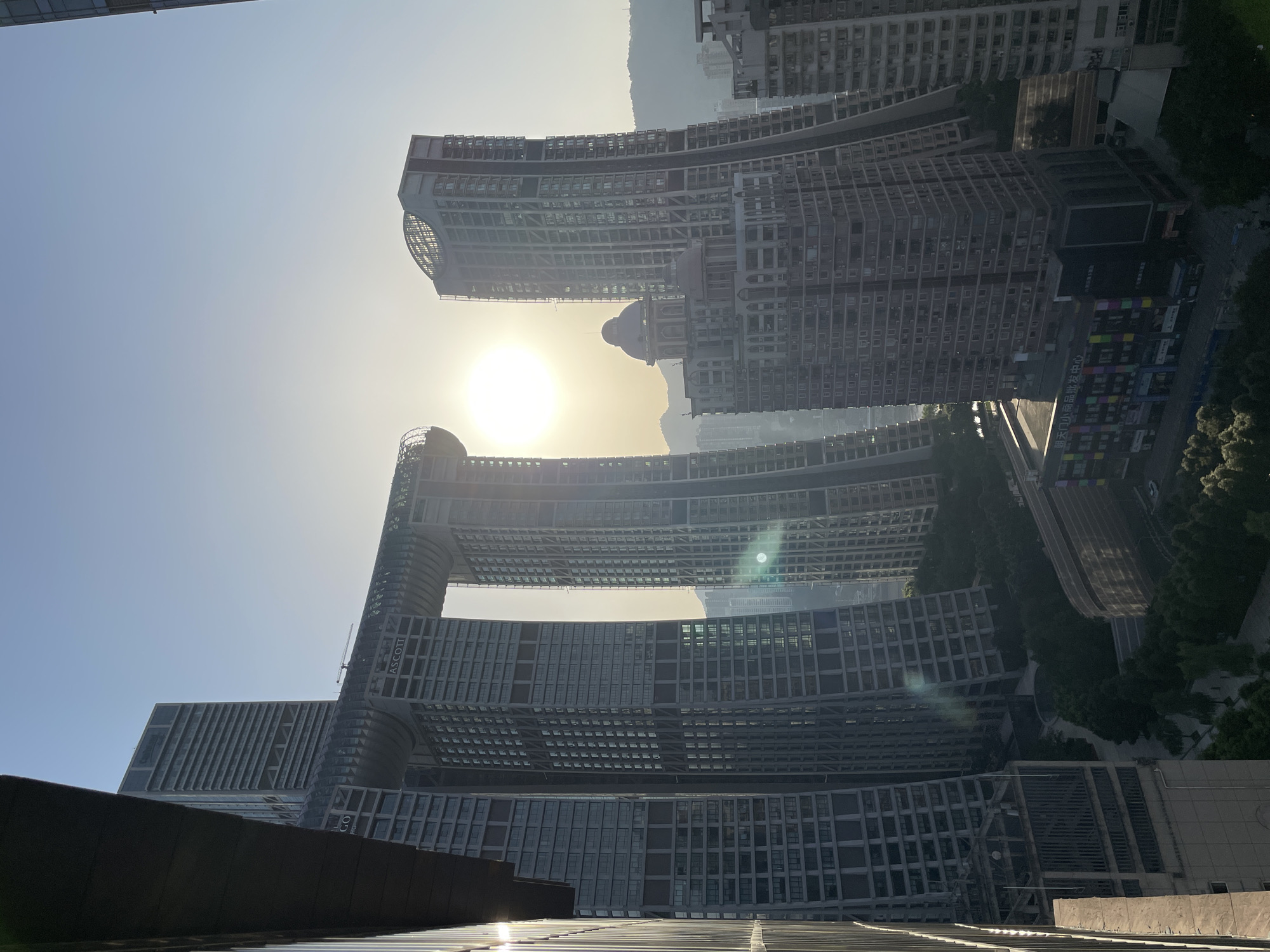 Raffles City towers over Chongqing's Yuzhong District at golden hour
