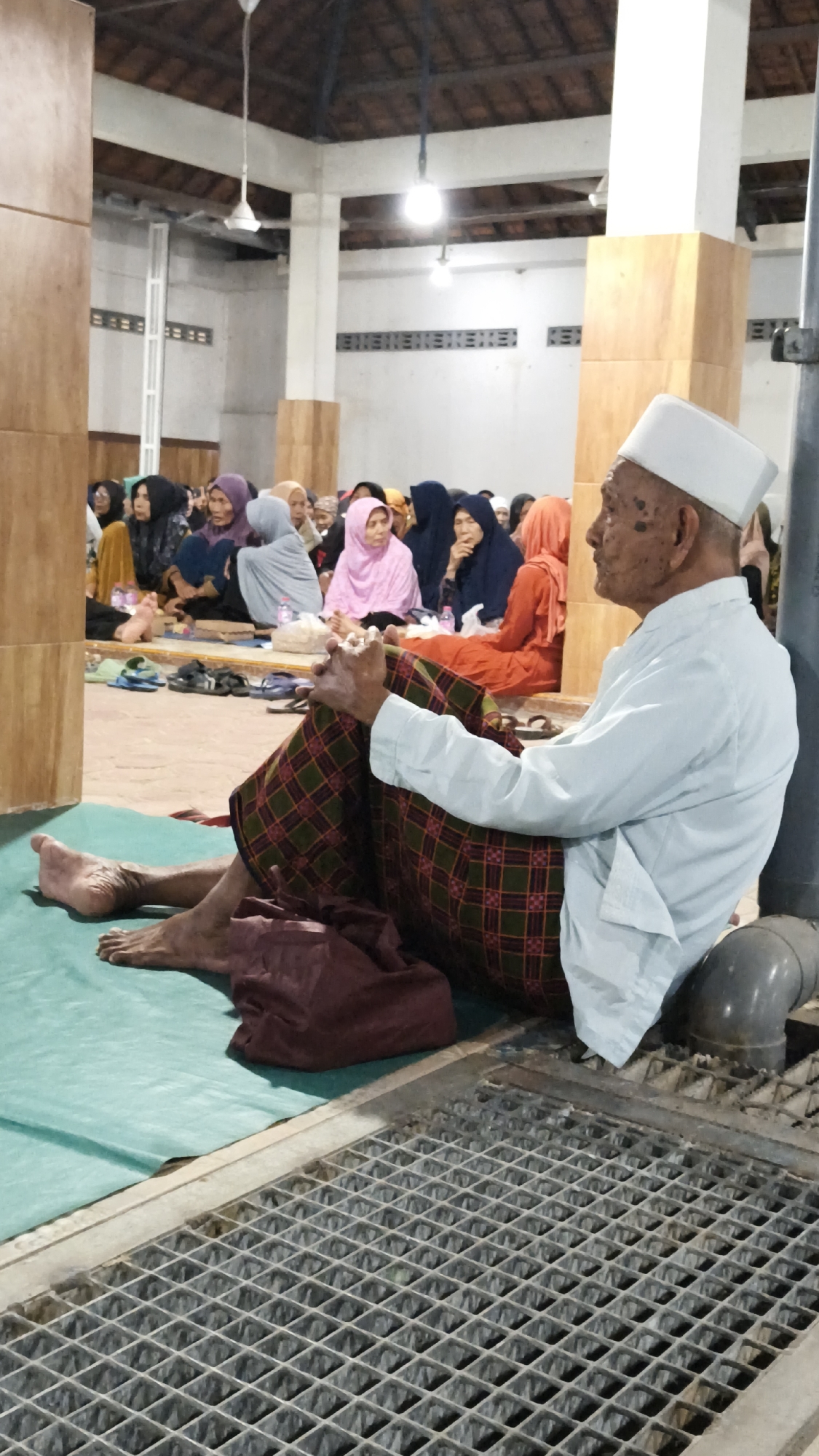 Indoor floor gathering in Dalegan, Indonesia