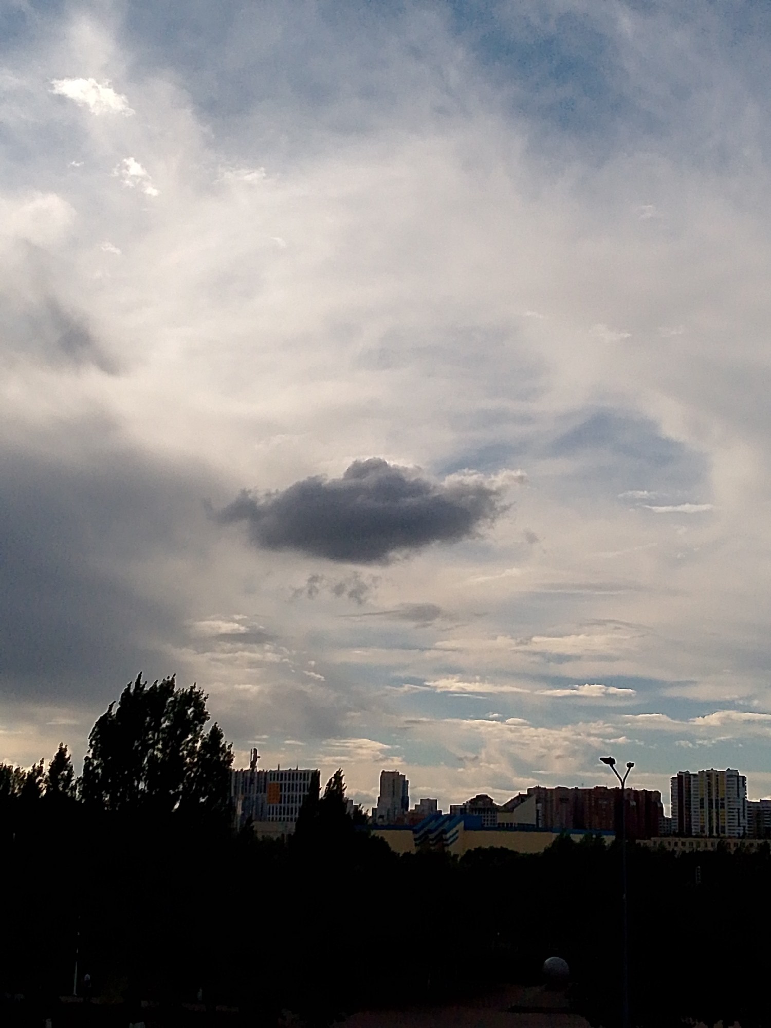 Storm clouds roll over Astana's skyline on a summer afternoon