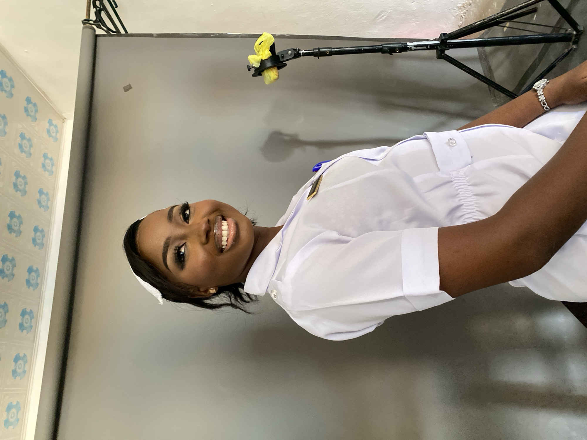Nursing graduate celebrates qualification in professional photo session