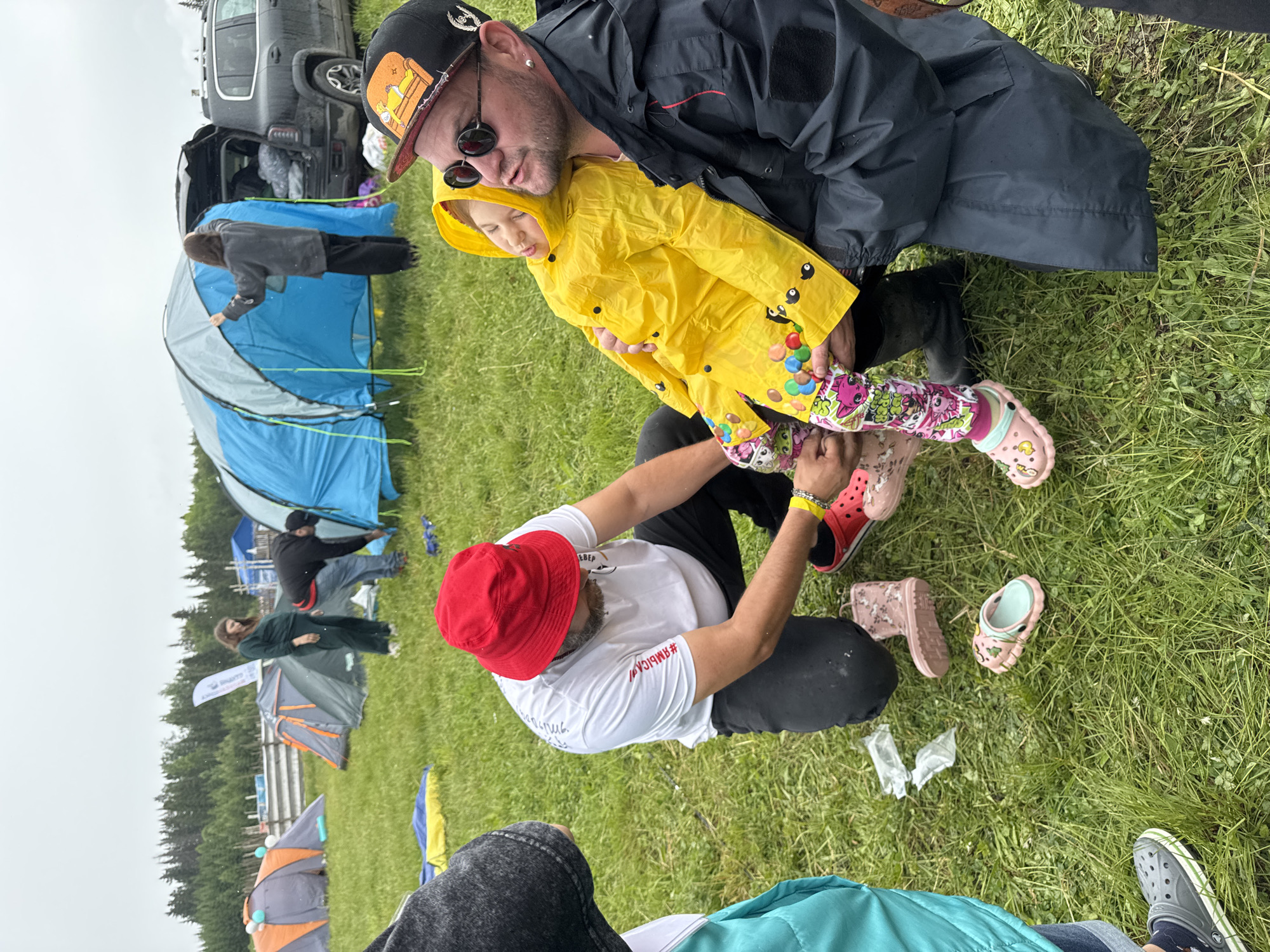 Outdoor festival with stage and food draws crowds in rural Russia