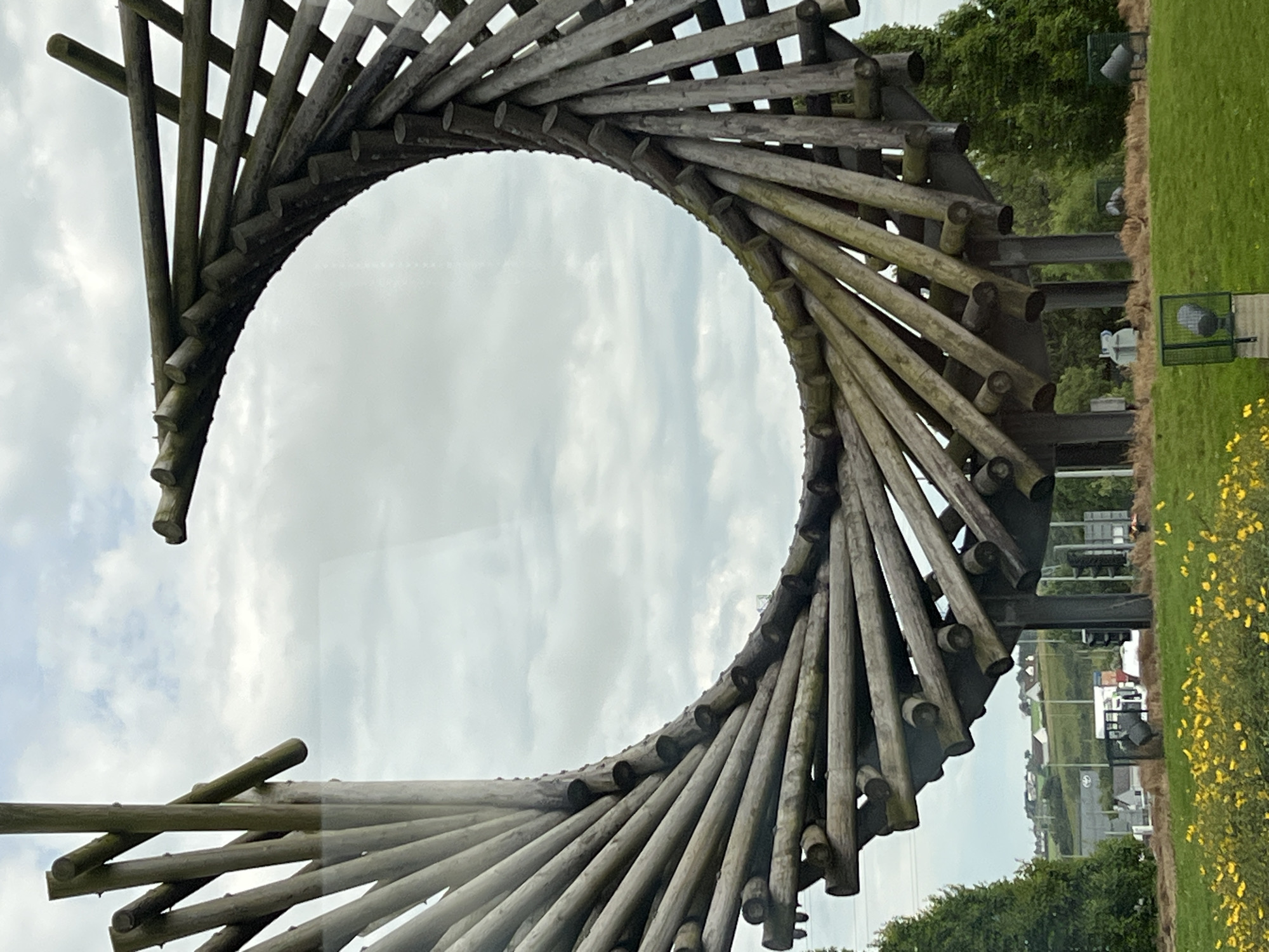 Intertwined timber sculpture at a Letterkenny roundabout