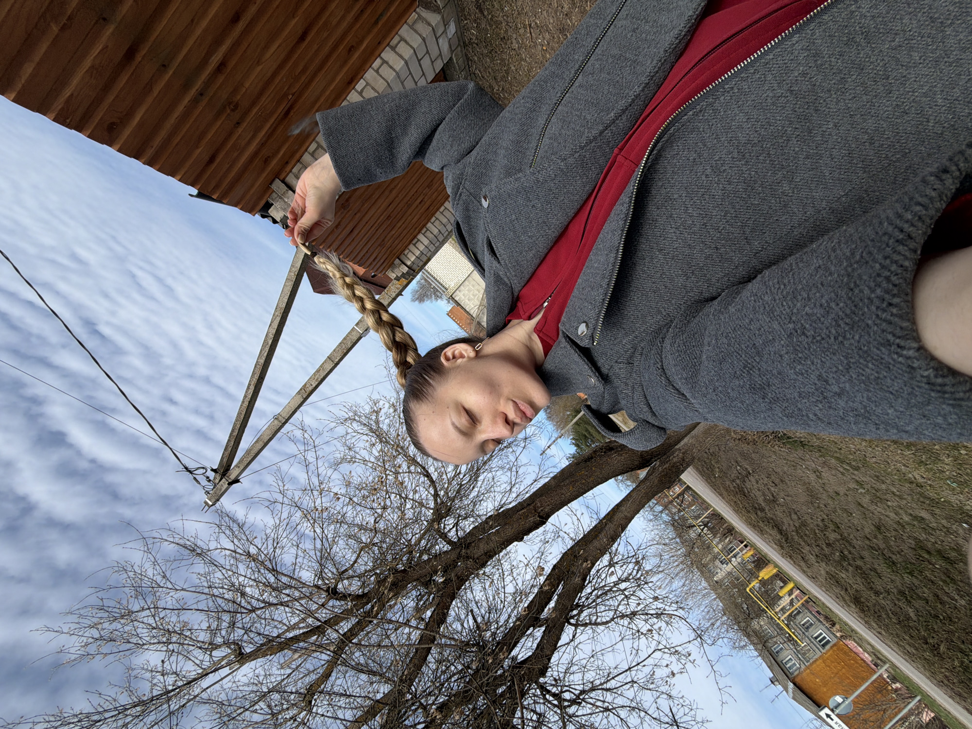 Woman takes outdoor selfies in Reshetnikovo, Russia