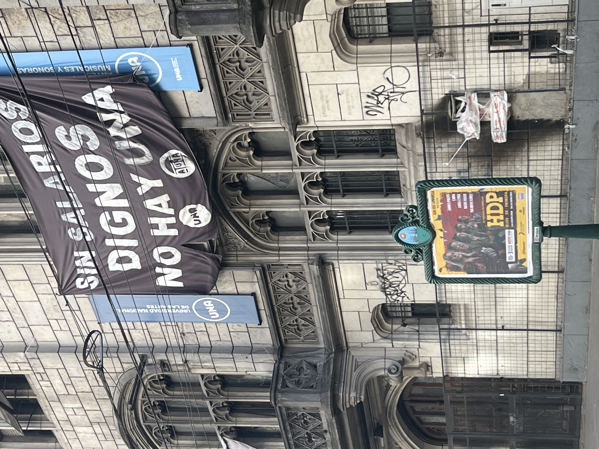 Buenos Aires Gothic architecture documented amid labor protest signage