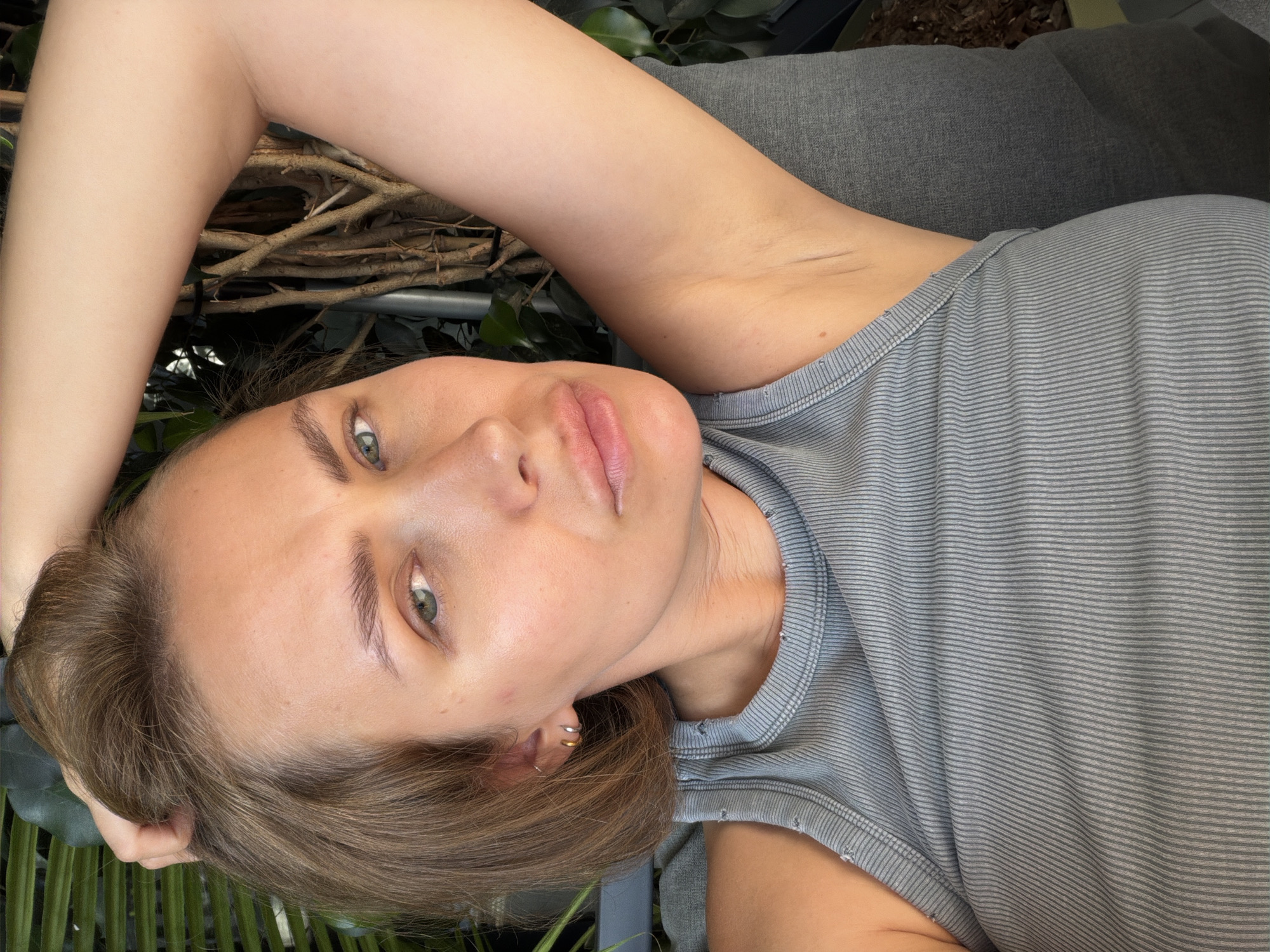Casual high-angle selfie in Tel Aviv on a summer afternoon.