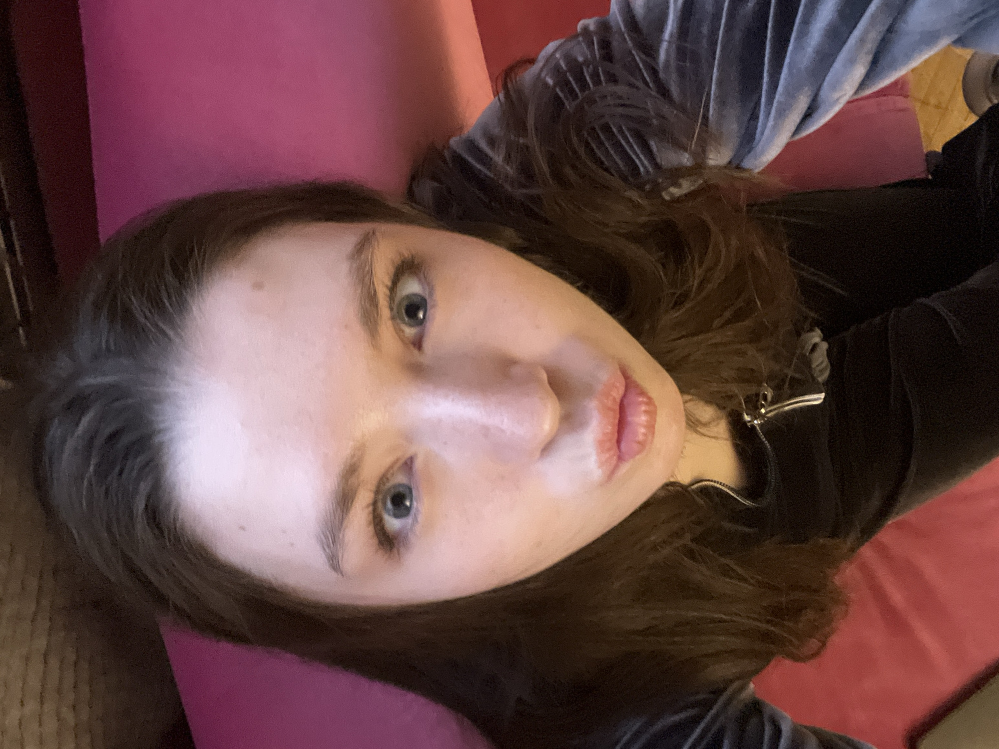 Woman resting on red surface observed in Moscow