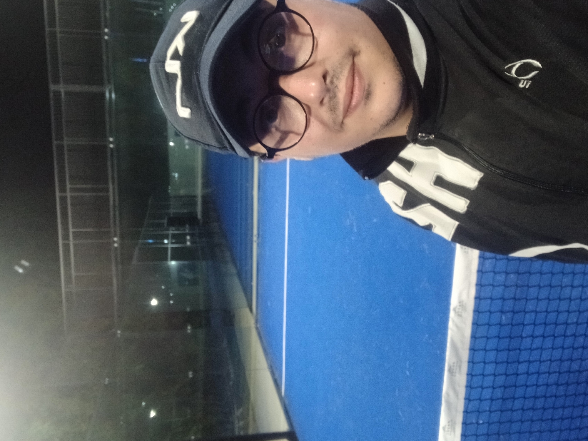 Night padel session captured in selfies at Meknes court