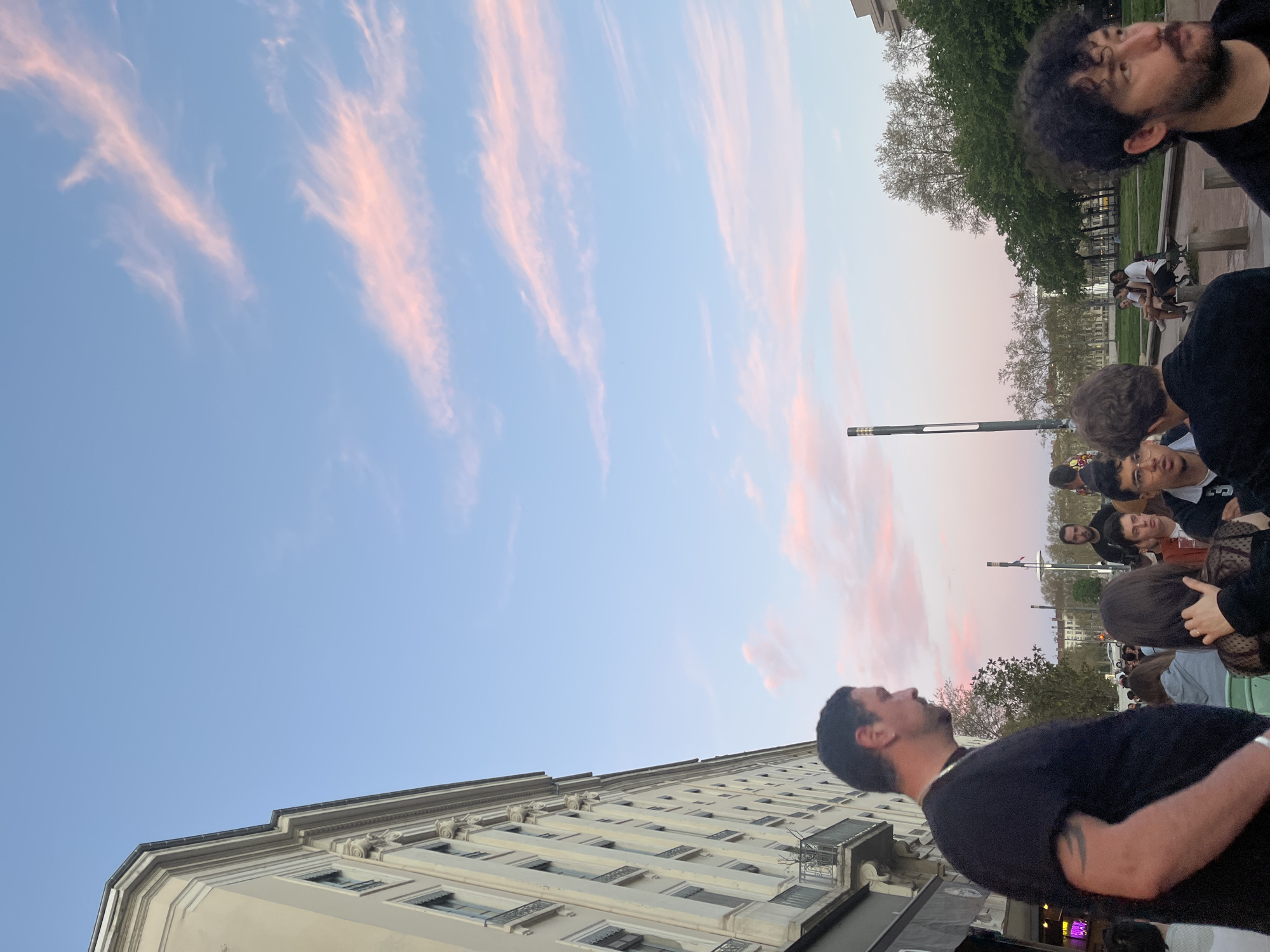 Evening social gathering documented in Lyon during twilight hours