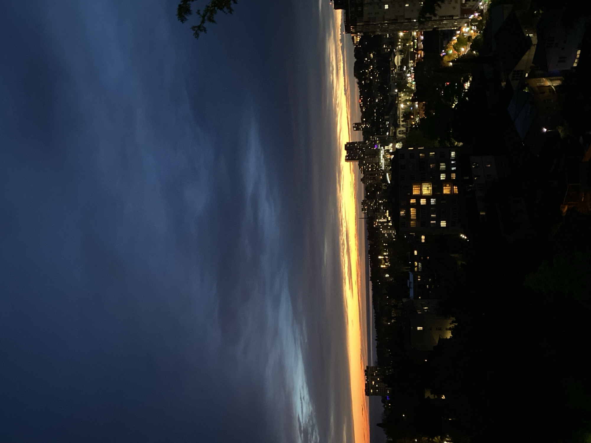 Evening twilight colors observed over Sochi cityscape
