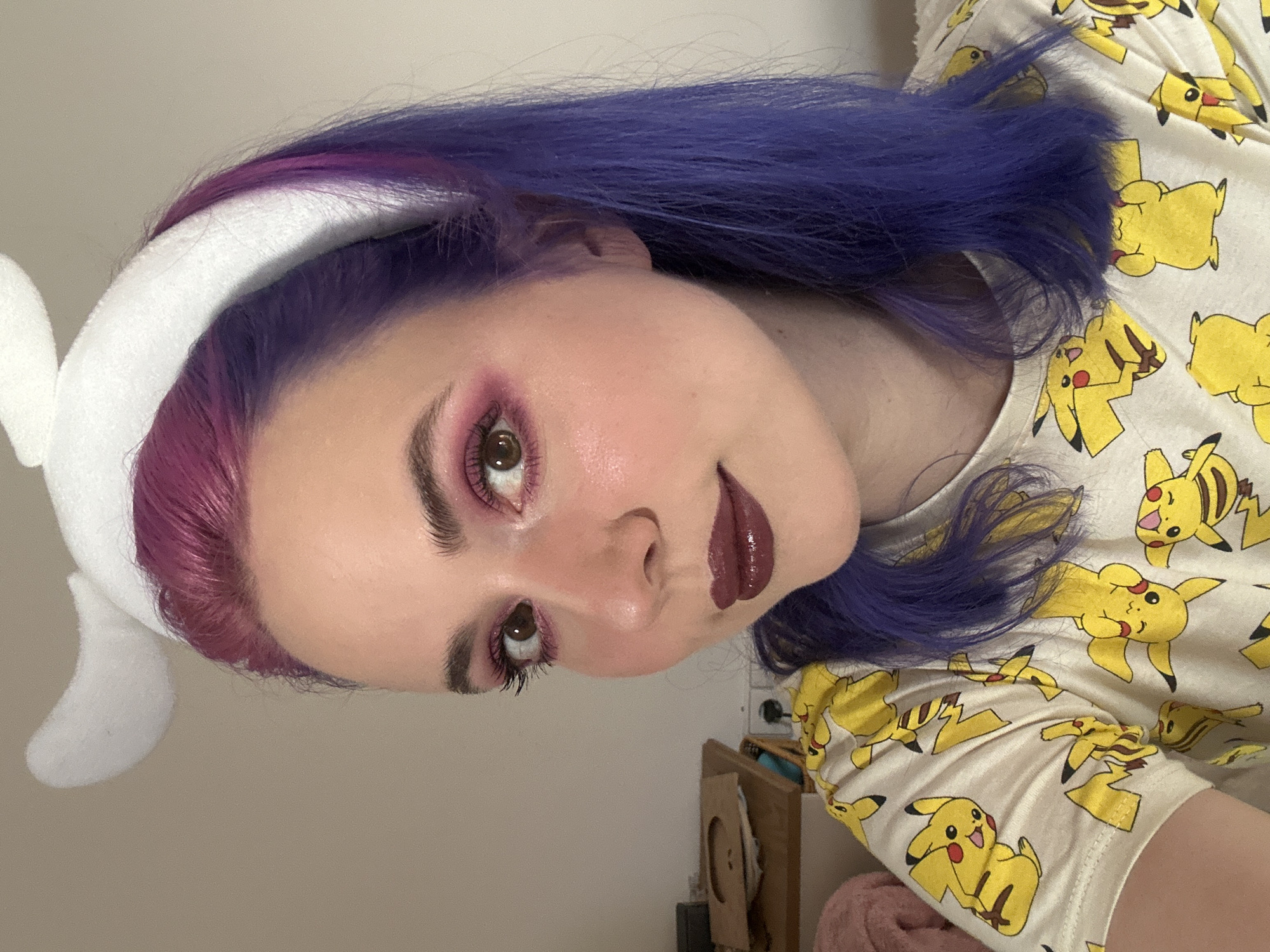 Cosplayer takes selfies in bunny ears, seeks makeup advice