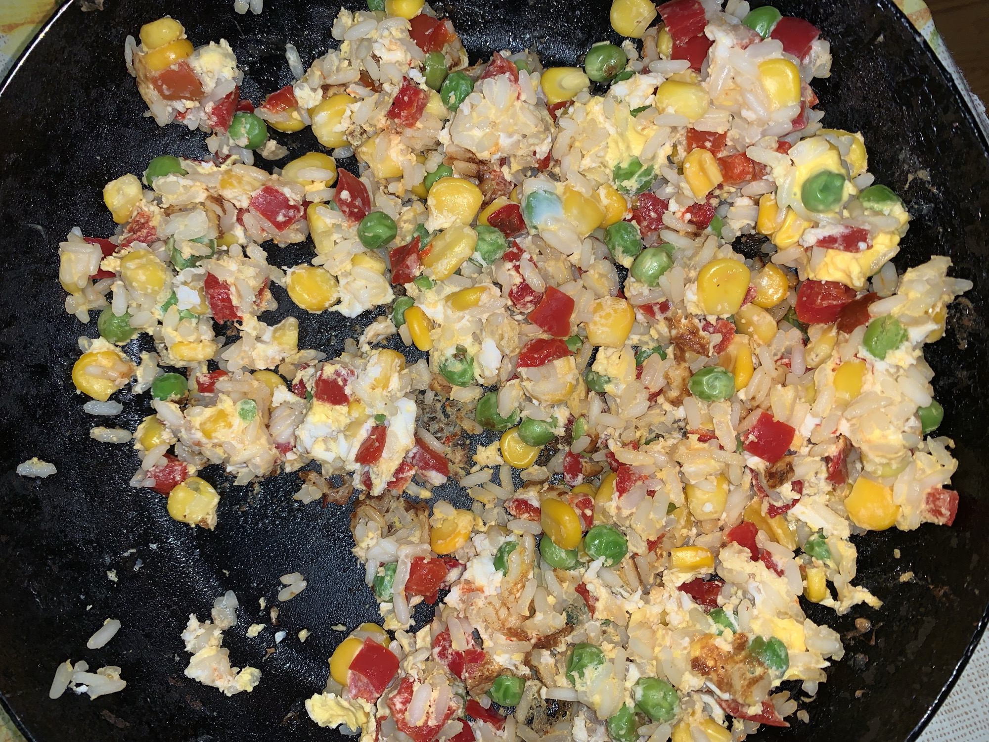 Home cooking session features fried rice and chicken stew