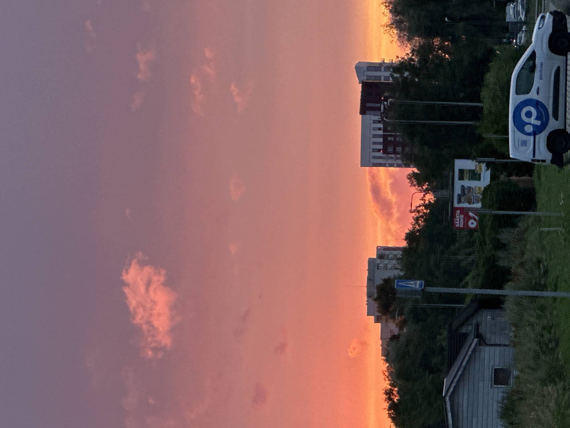 Summer sunset over a Tallinn suburb, July evening
