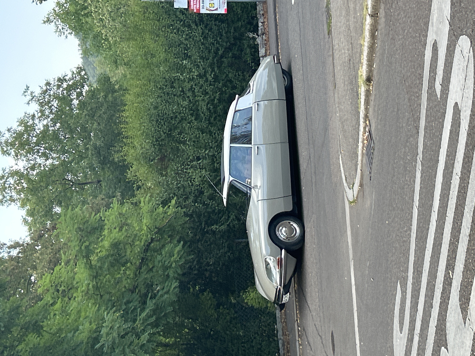 Vintage Citroën DS parked, two angles, August 2026