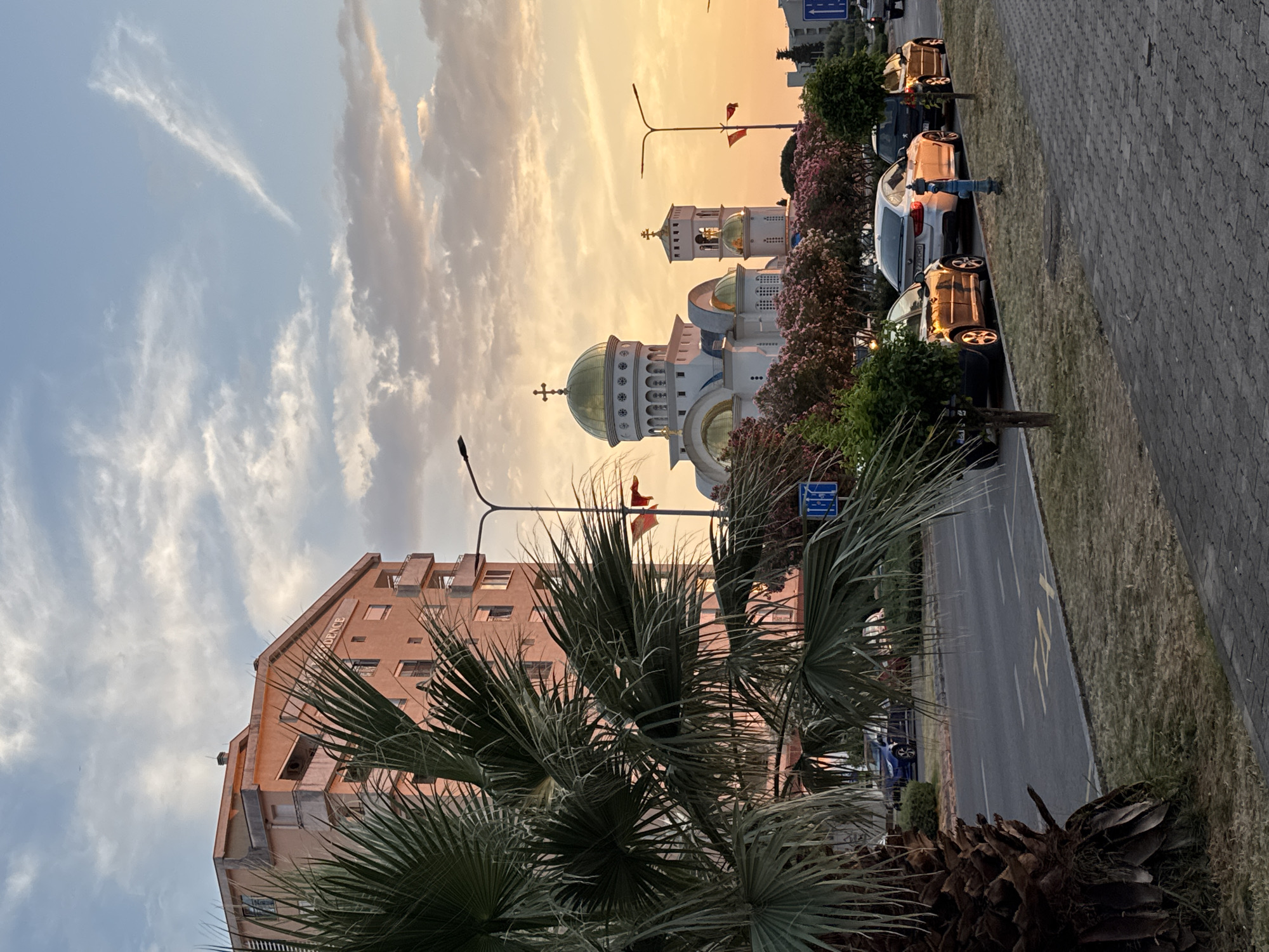 Sunset stop in Bar, Montenegro with an adventure bike in tow