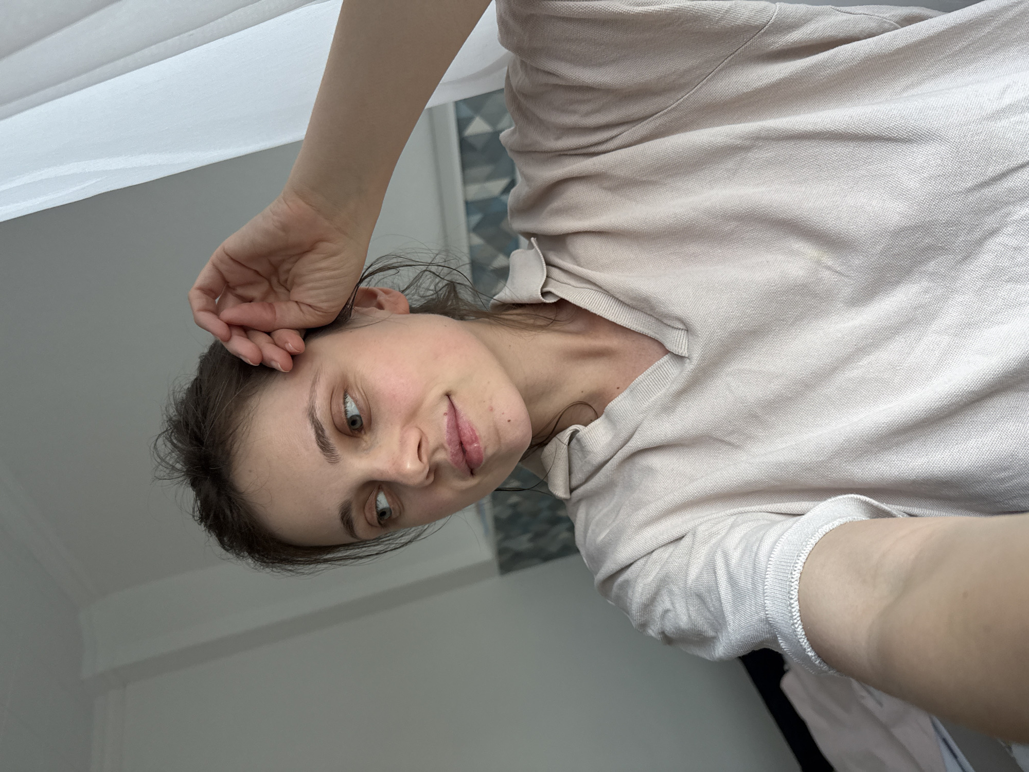 Woman documented in casual bedroom moments in Kőröshegy, Hungary